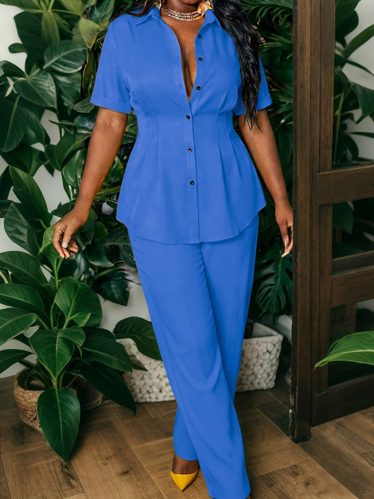 Two-Piece Set Featuring a Chic Top And Relaxed Long Pants