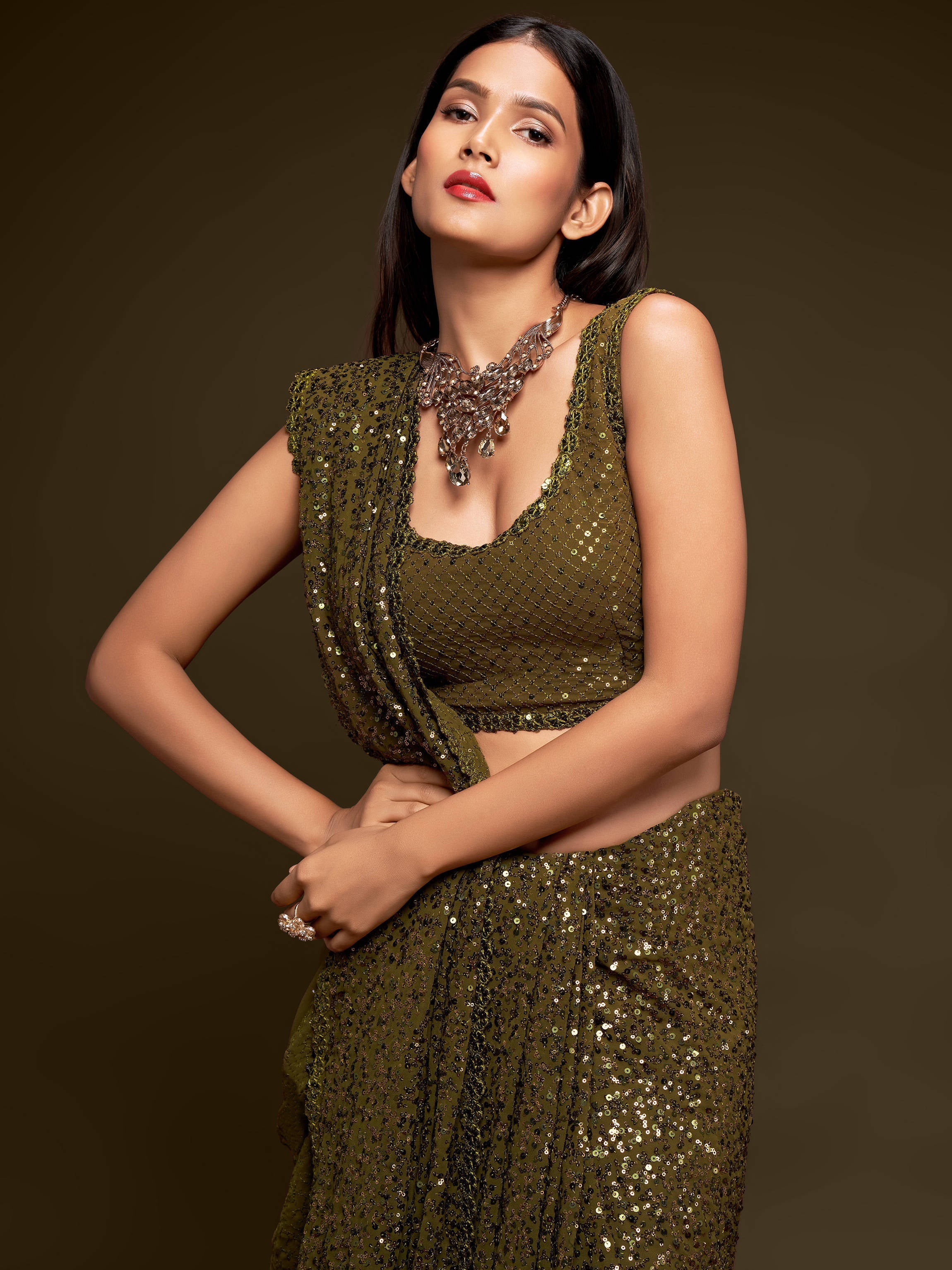 Superb Olive Green Sequined Georgette Party Wear Saree