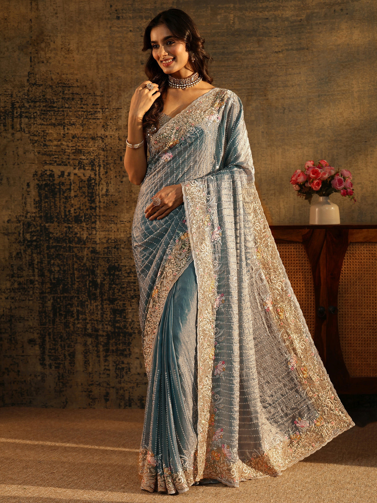 Anouk Art Powder Blue Embellished Tissue Saree with Floral Border