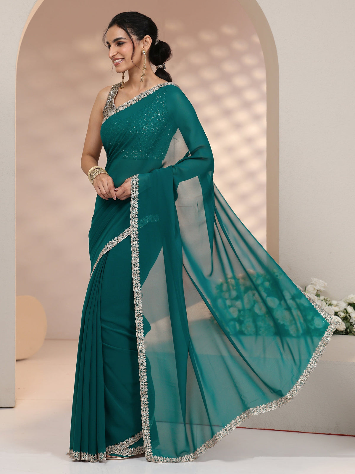 Anouk Teal Green Georgette Saree with Embroidered Border