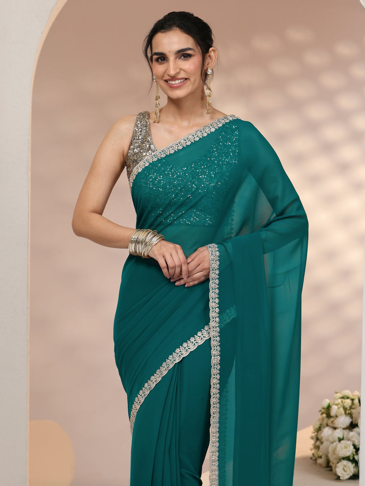 Anouk Teal Green Georgette Saree with Embroidered Border