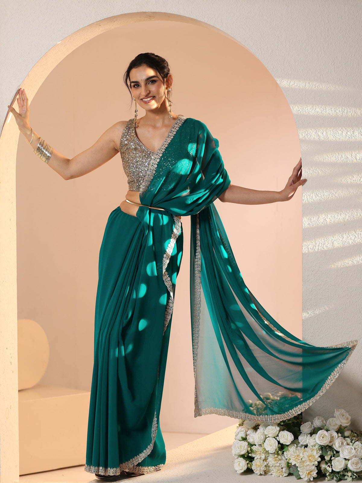 Anouk Teal Green Georgette Saree with Embroidered Border
