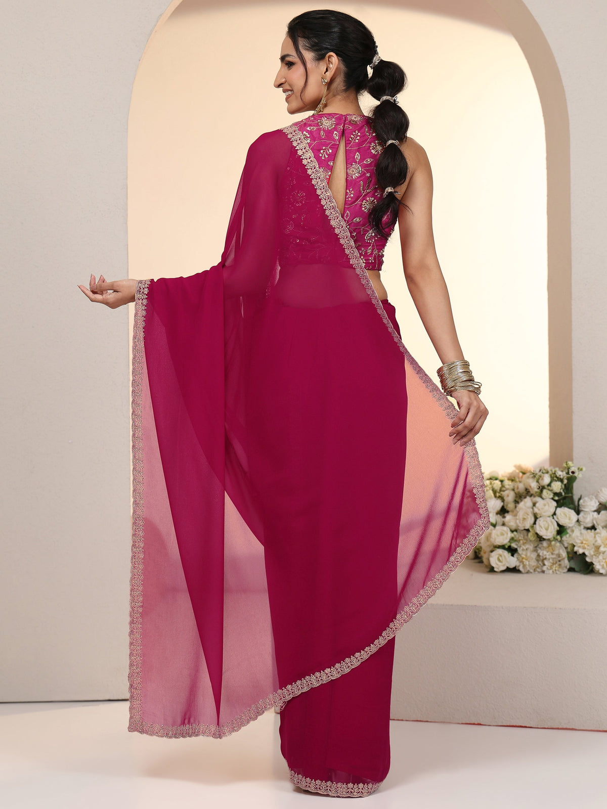 Anouk Rani Pink Georgette Saree with Embroidered Border