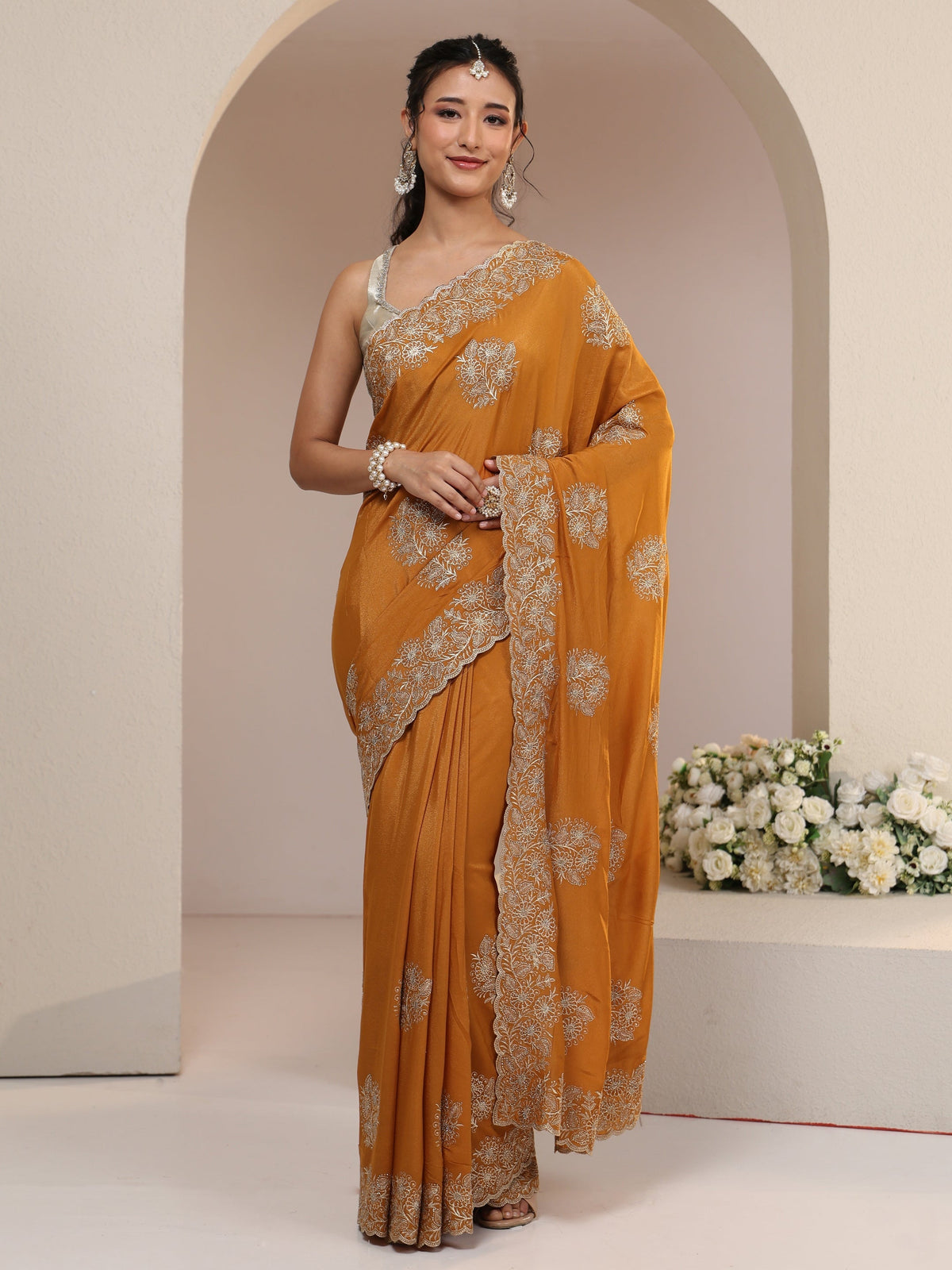 Anouk Burnt Orange Satin Saree with Embroidered Floral Motifs