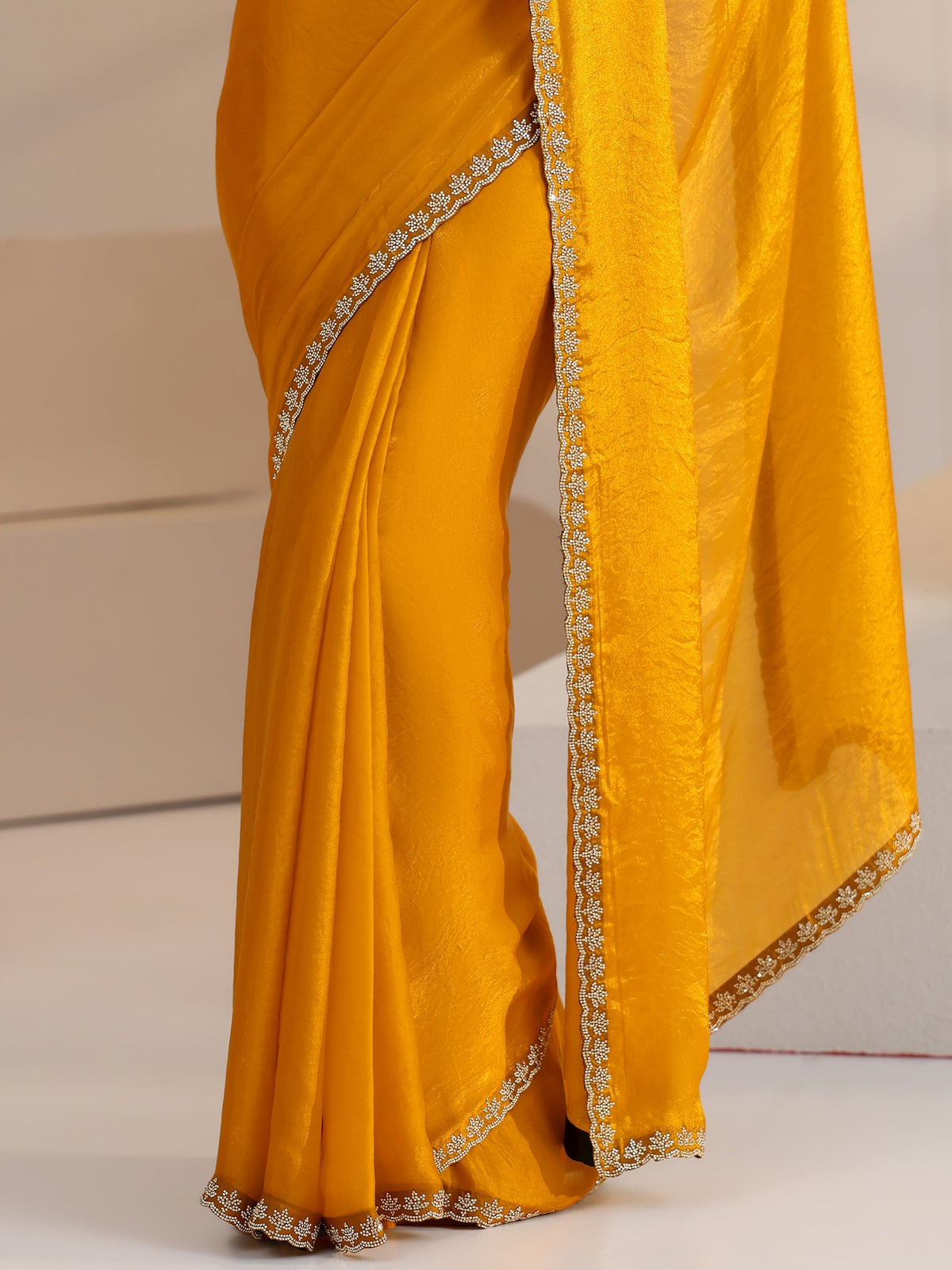 Anouk Mustard Yellow Tissue Saree with Stone Work Border