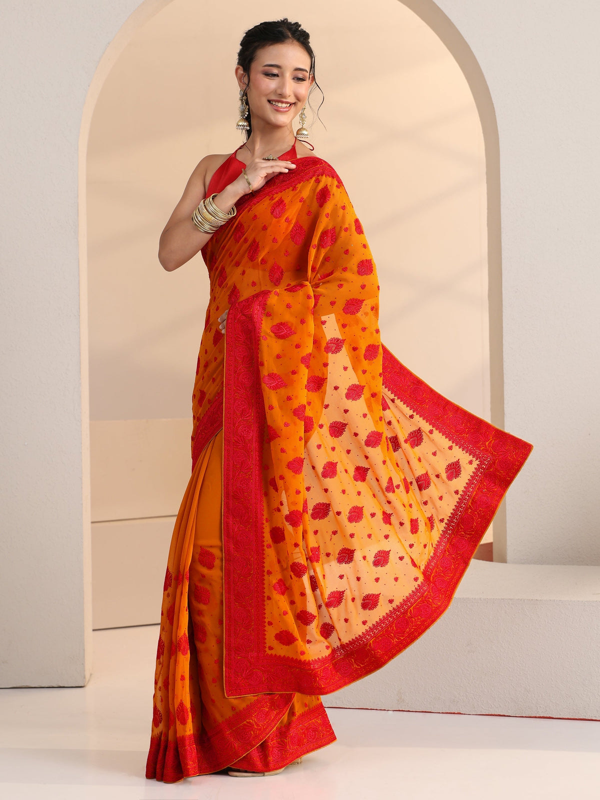 Anouk Pulp Orange Georgette Saree with Embroidered Border