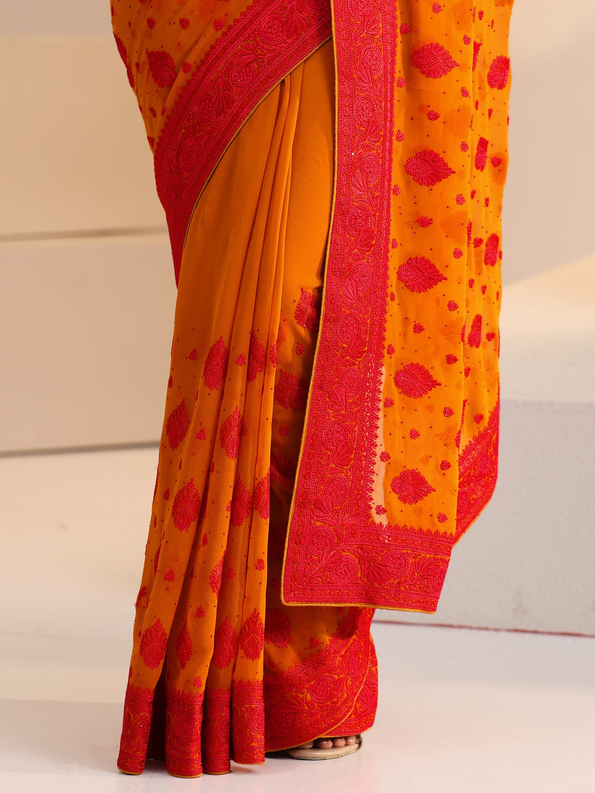 Anouk Pulp Orange Georgette Saree with Embroidered Border