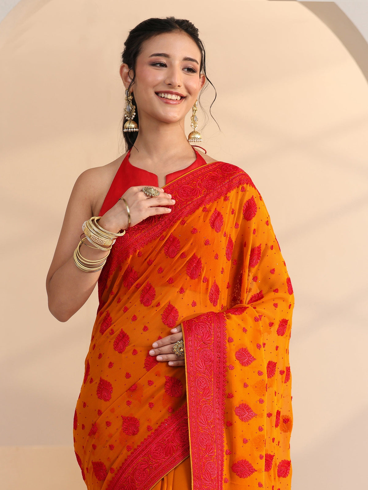 Anouk Pulp Orange Georgette Saree with Embroidered Border
