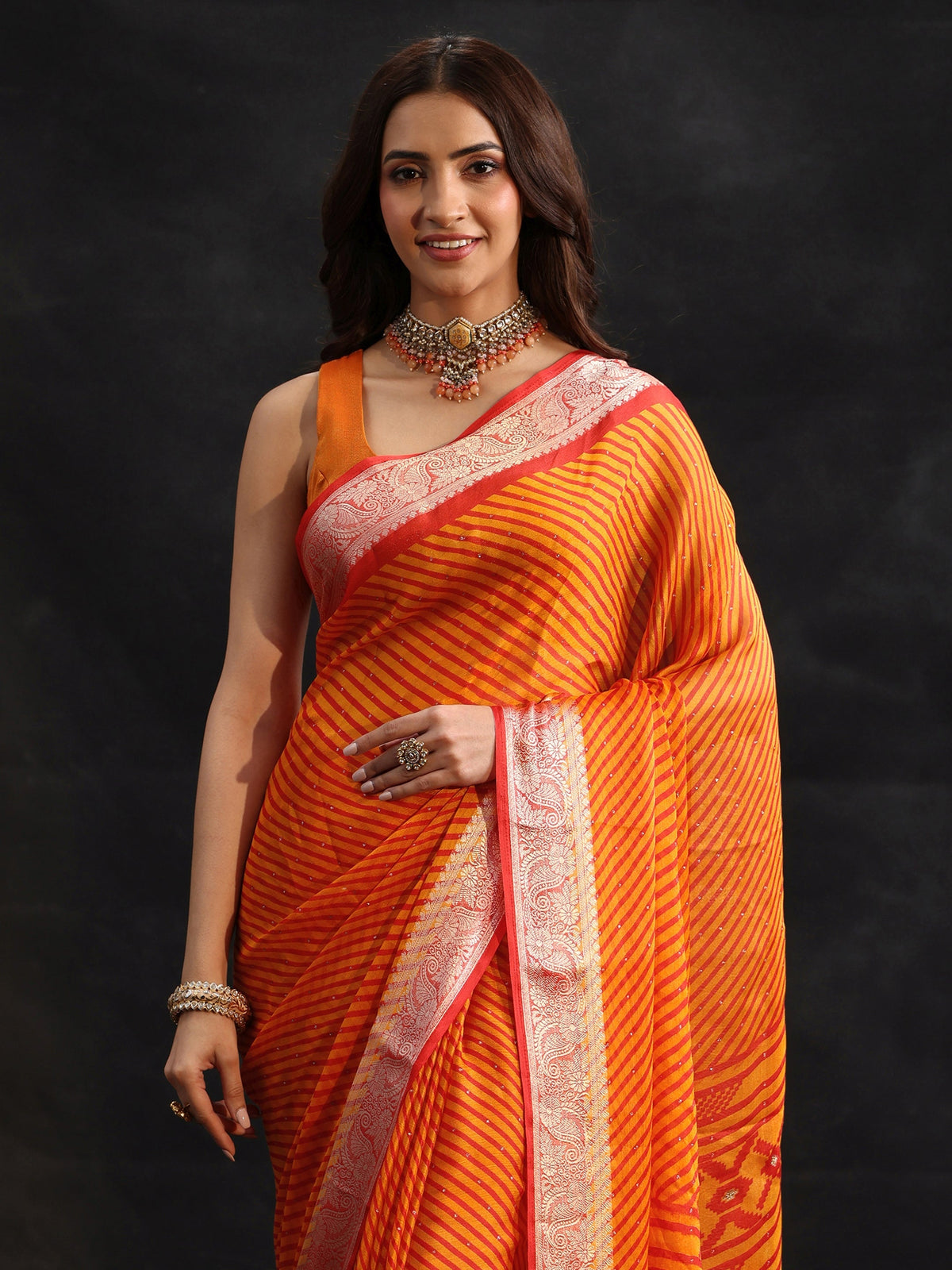 Anouk Orange Striped Chiffon Saree with Paisley Border