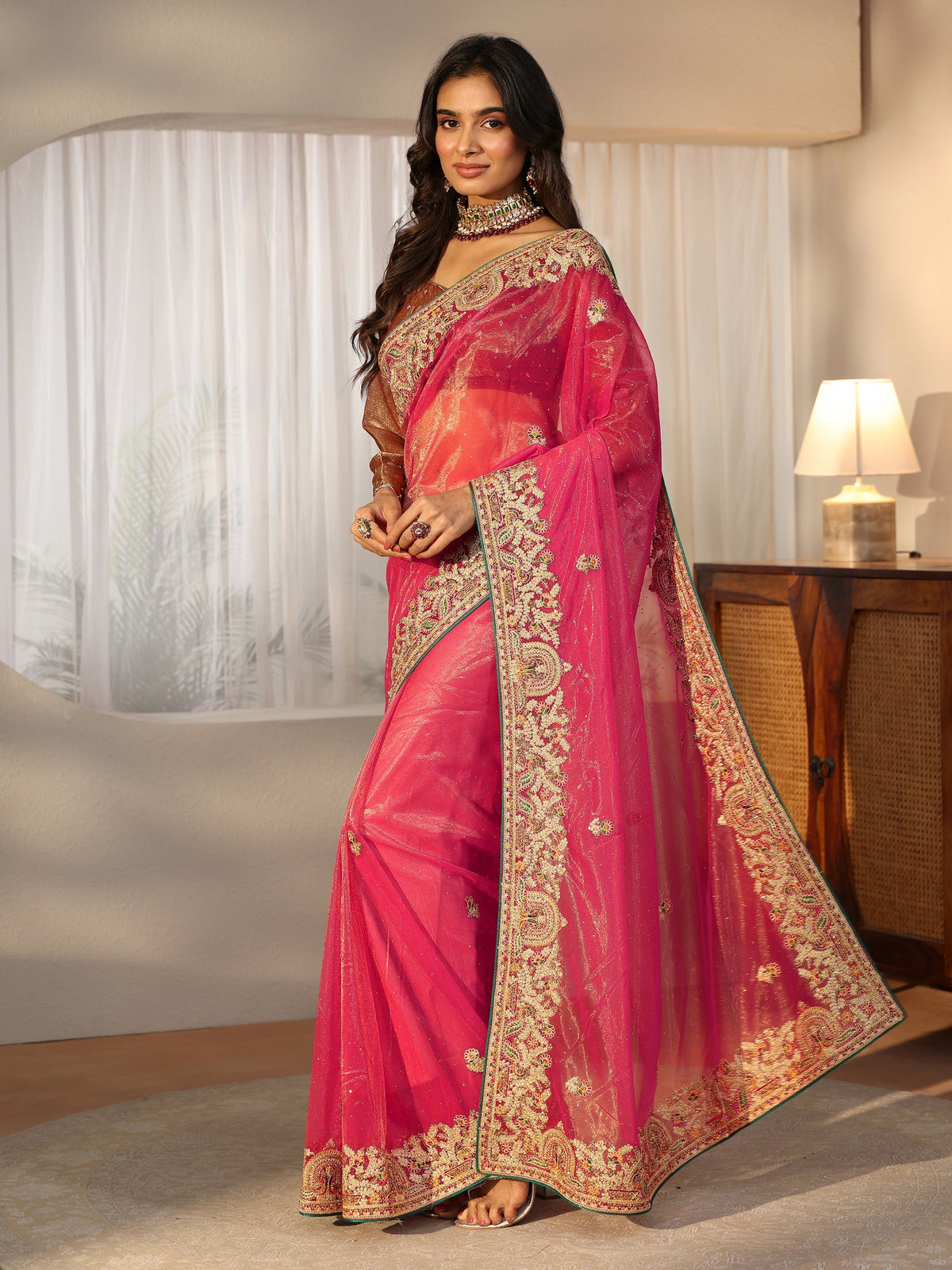 Anouk Peach Net Saree with Embroidered Border