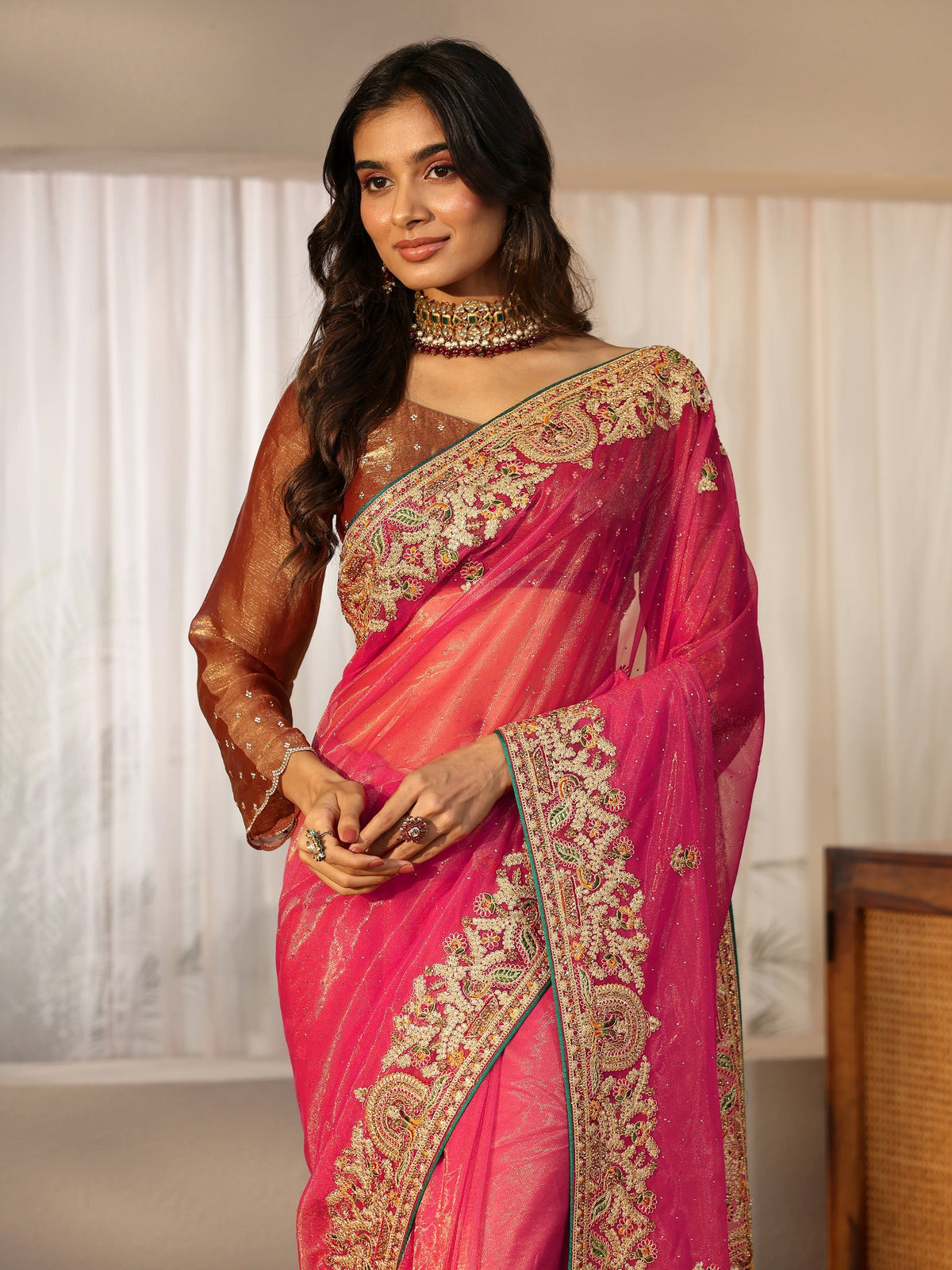 Anouk Peach Net Saree with Embroidered Border