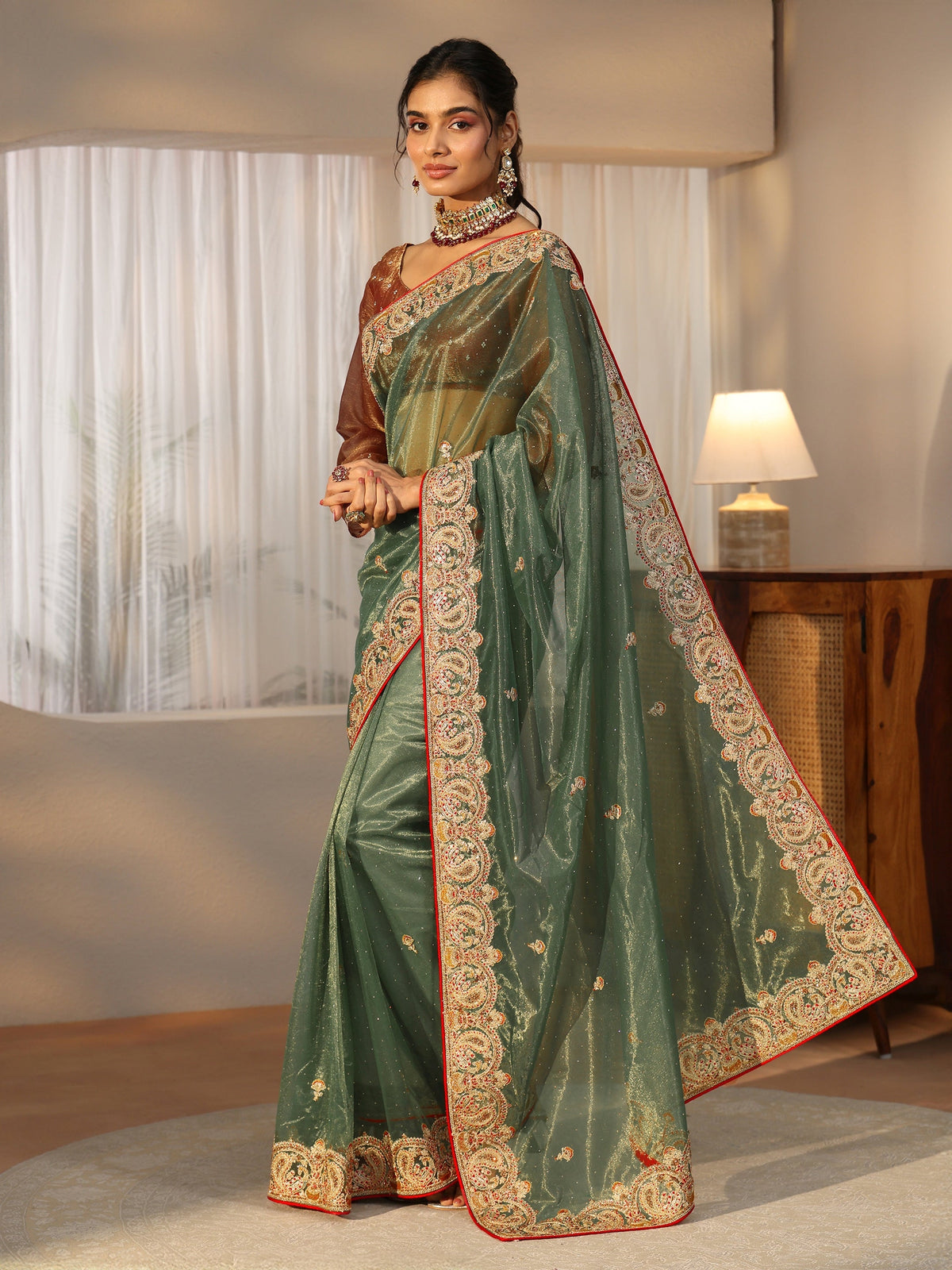 Anouk Olive Green Net Saree with Embellished Paisley Border