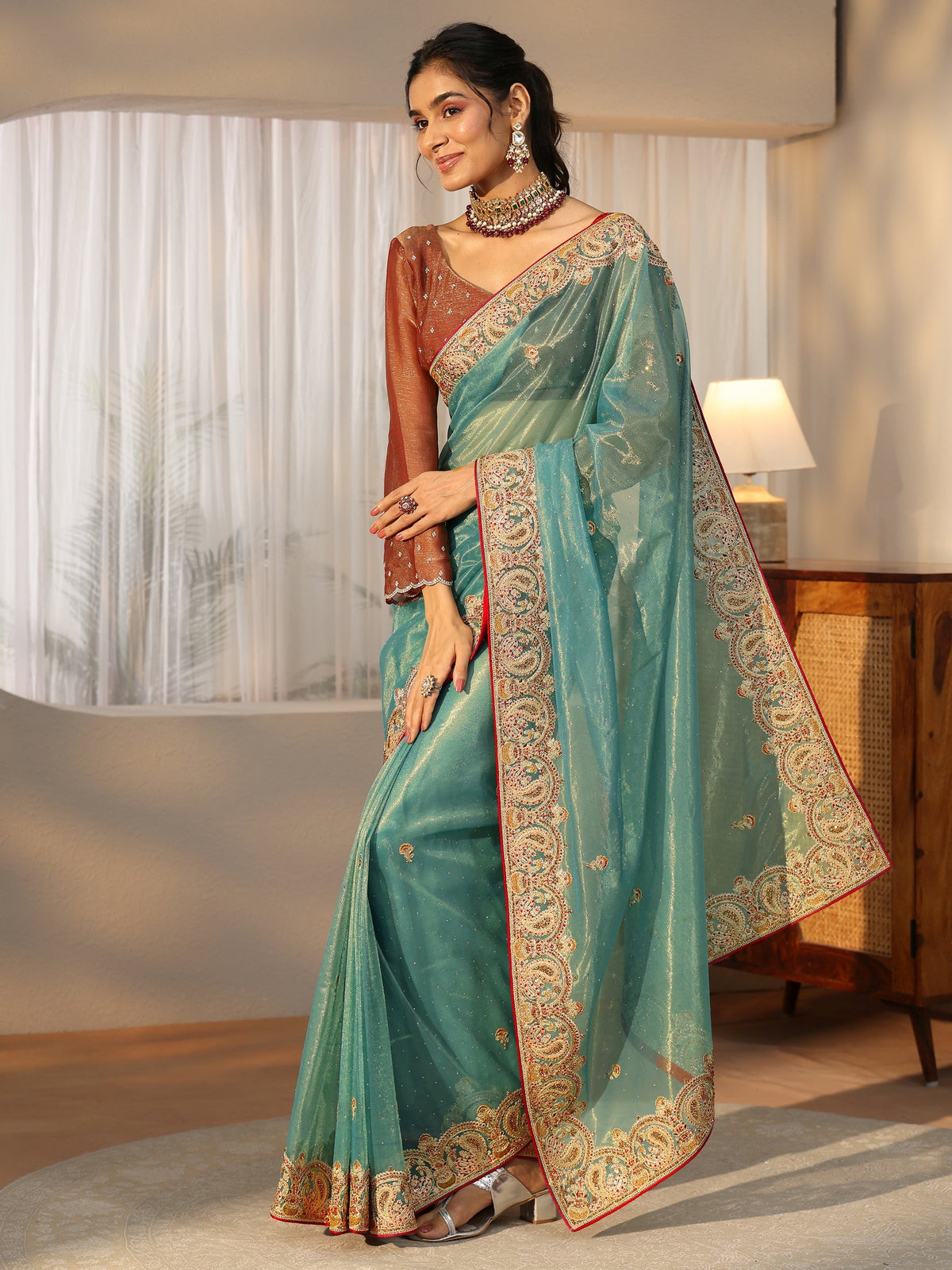 Anouk Aqua Blue Net Saree with Embellished Paisley Border