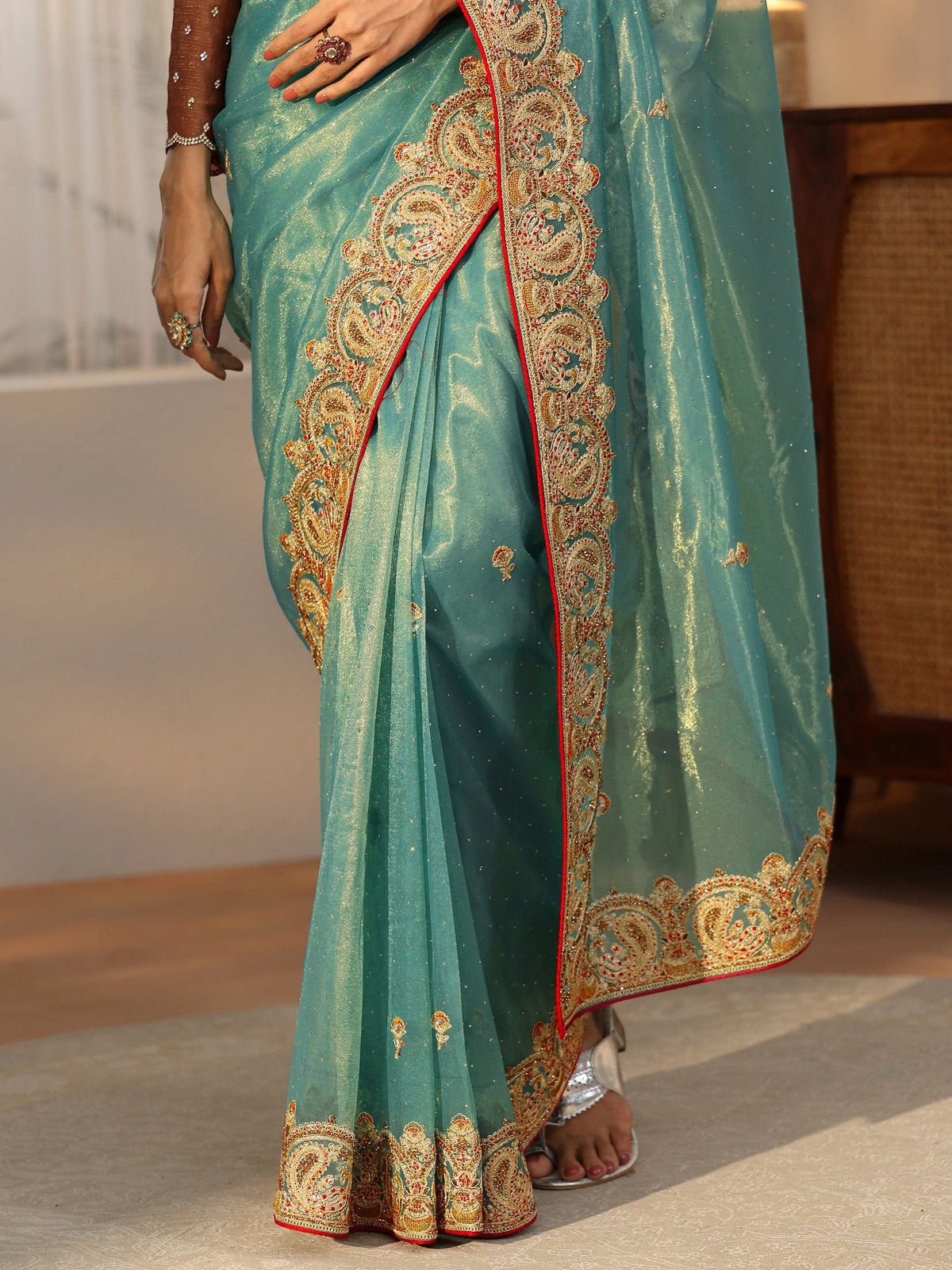 Anouk Aqua Blue Net Saree with Embellished Paisley Border