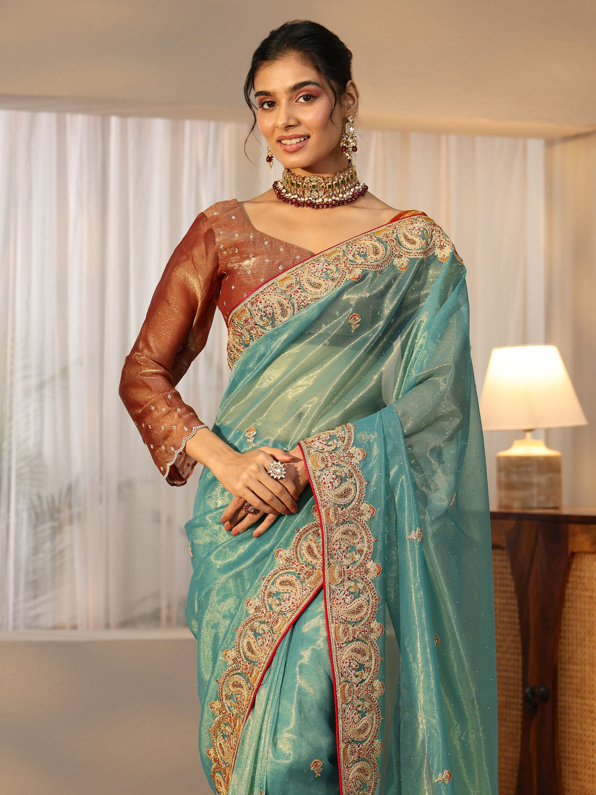 Anouk Aqua Blue Net Saree with Embellished Paisley Border