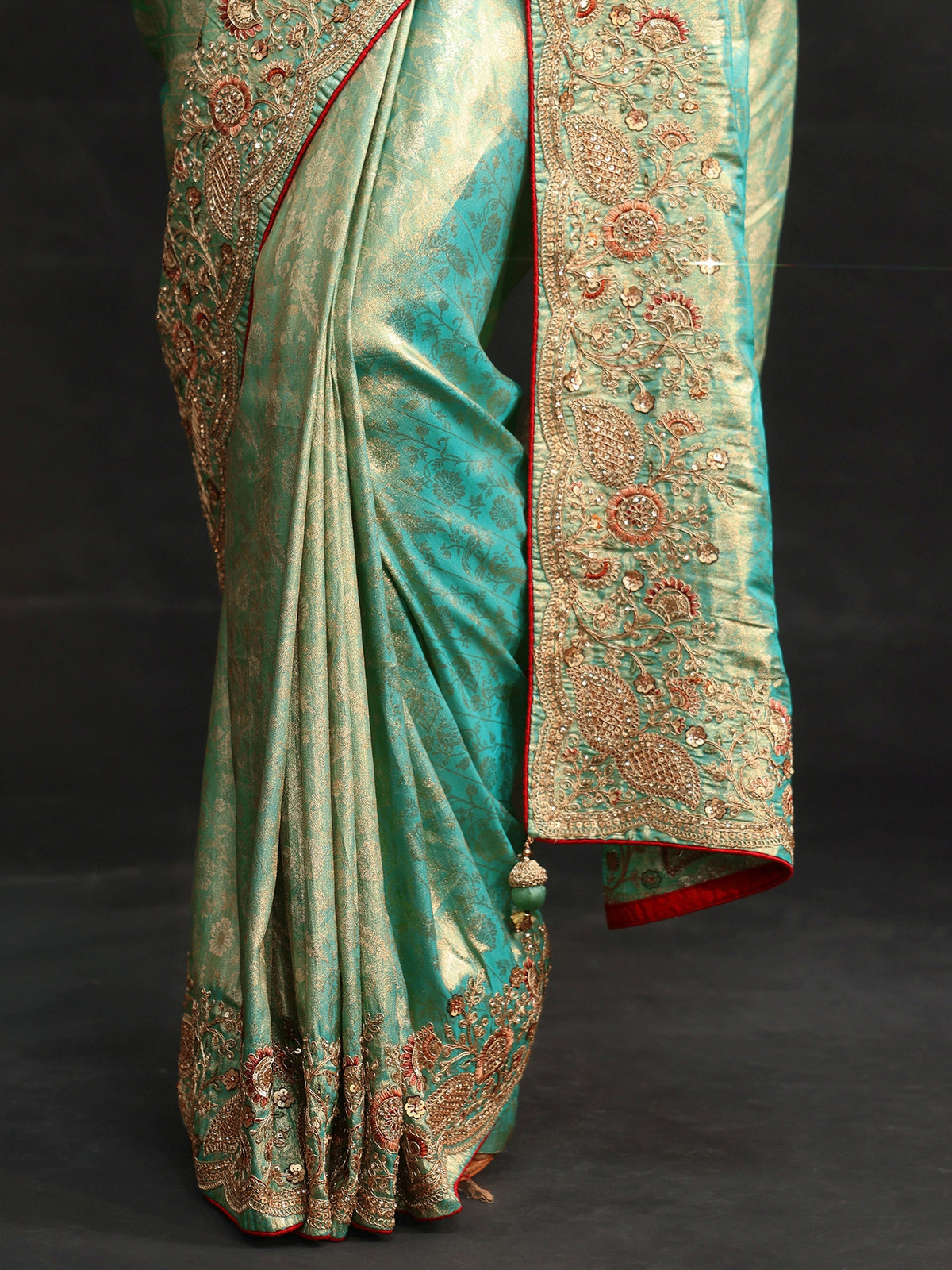 Anouk Aqua Blue Woven Design Satin Saree with Embellished Border