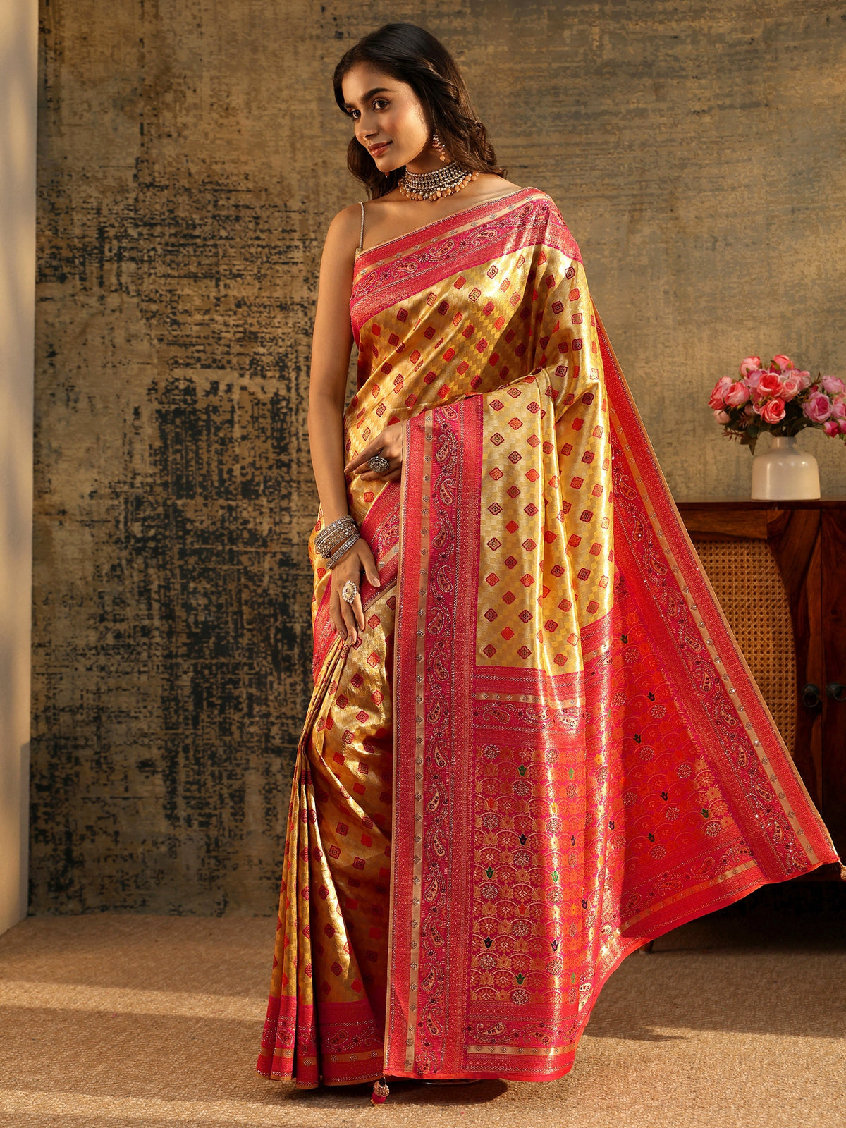 Anouk Mustard Woven Silk Blend Saree with Paisley Embellished Border