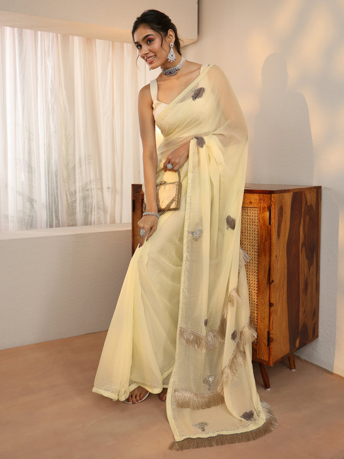 Anouk Light Yellow Tissue Saree with Tassel Embellished Pallu