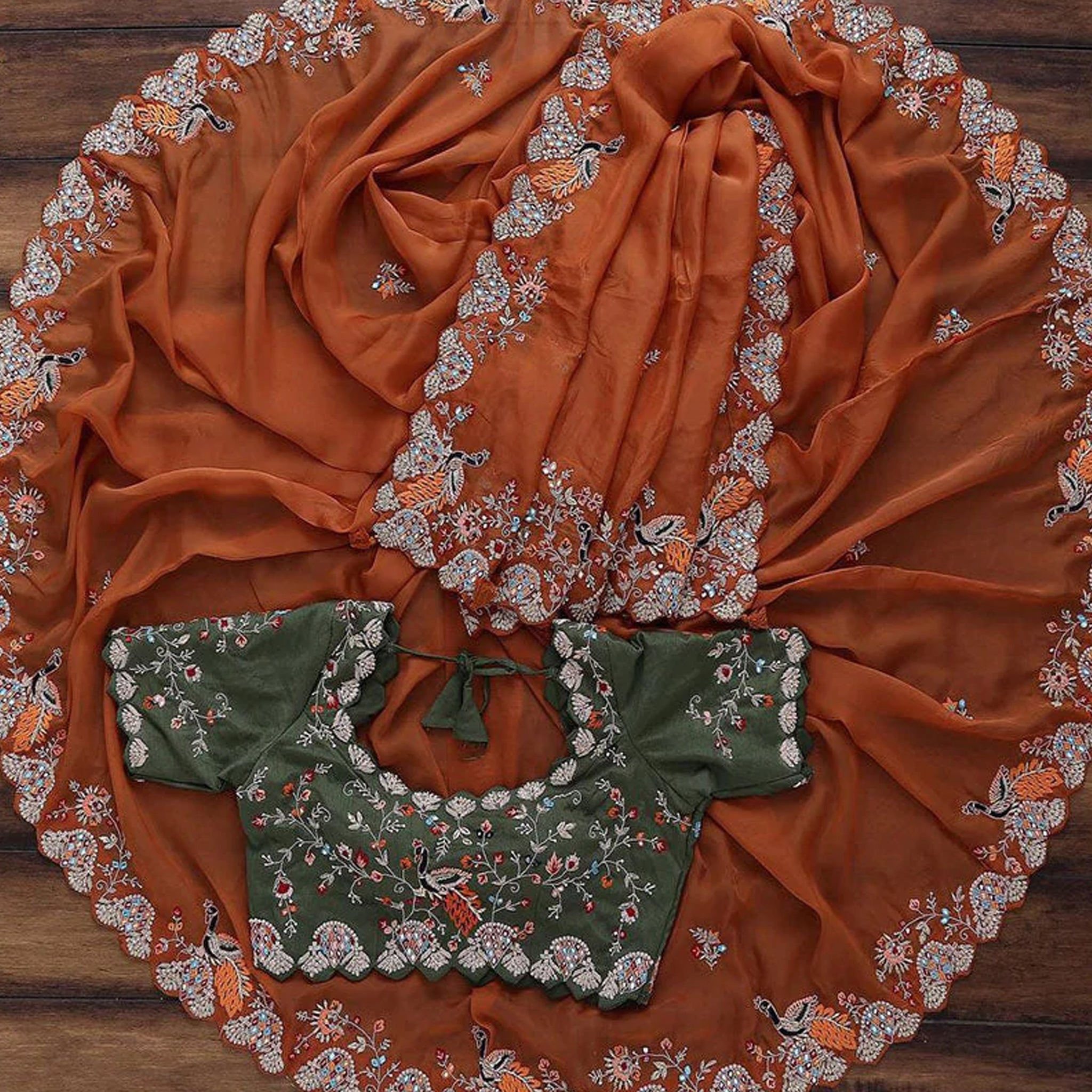 Beautiful Organza Orange Saree with Embroidery work and Contrast matching Mehendi Blouse