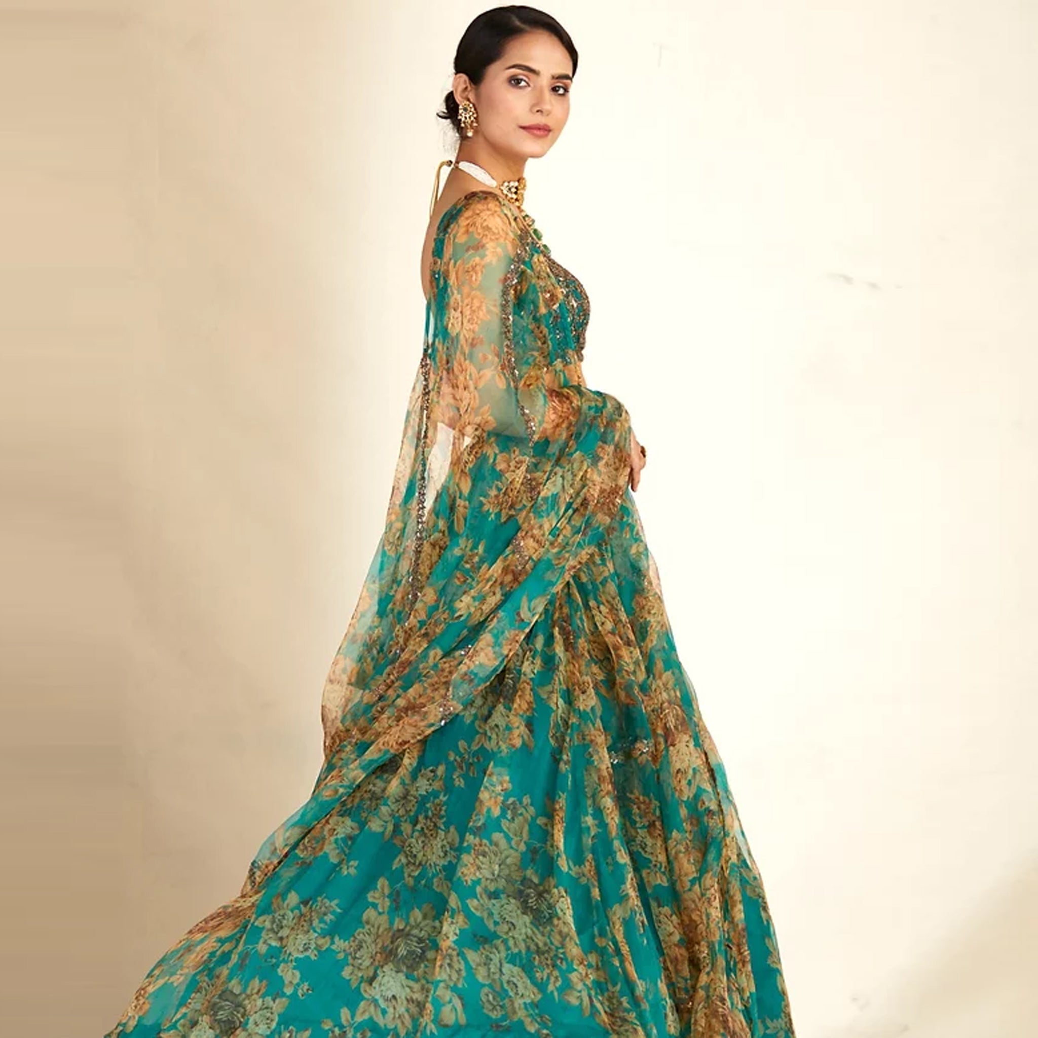 Bottle Green Organza Lehenga Choli with Dori and Sequence Work
