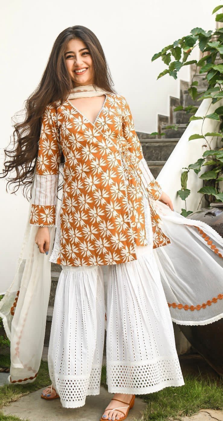 Elegant Procin print Angrakha Kurti Set with Lace and Tassel