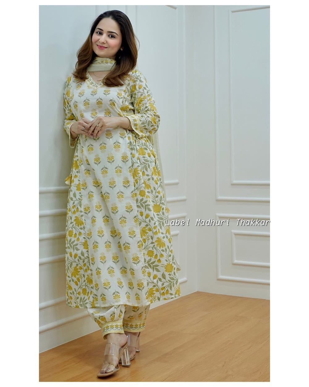 White Floral Afghani Suit Set with Side Waist Tassels and Motifs