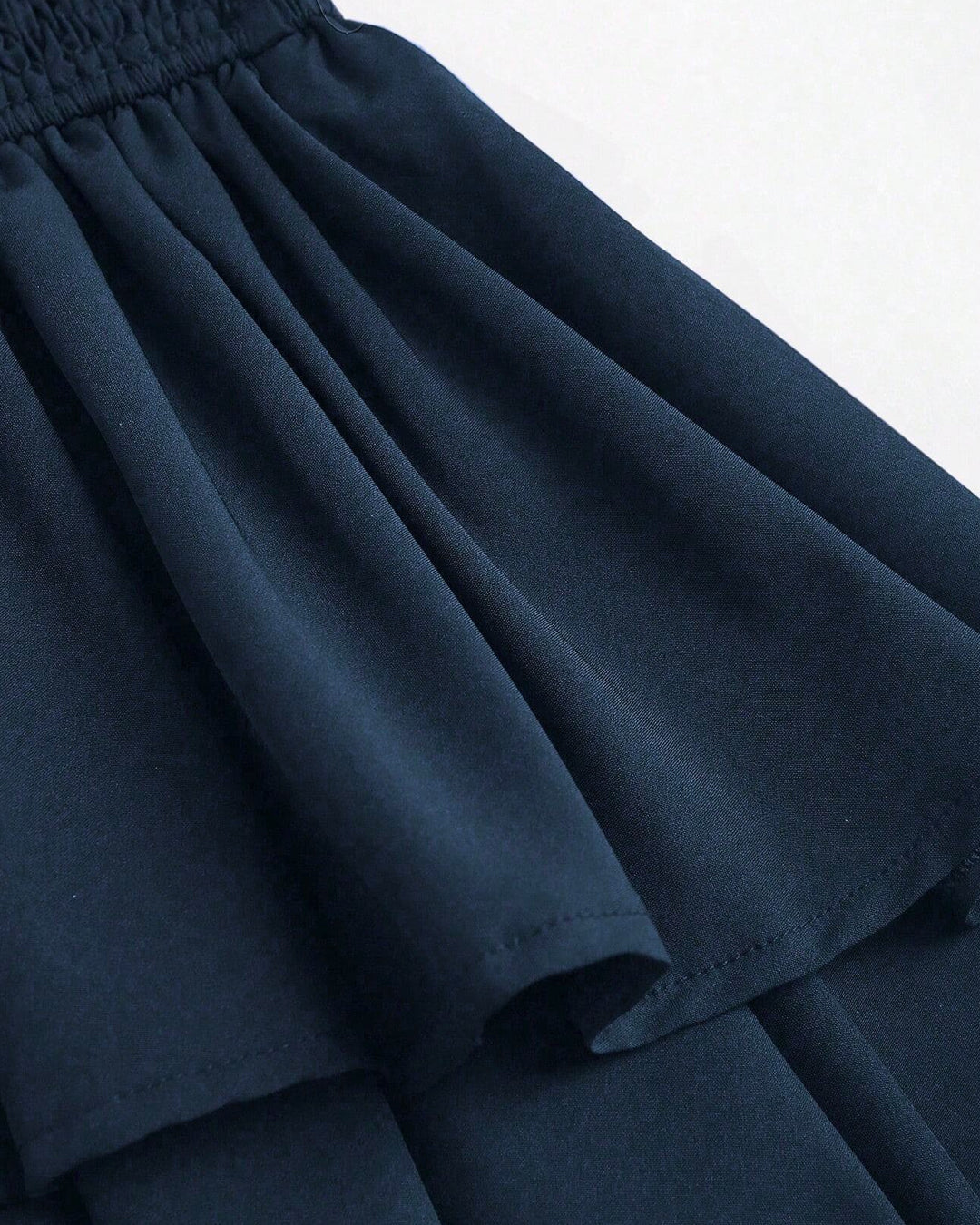 Cinched Waist Bow Halter Neck Mini Dress in Navy Blue