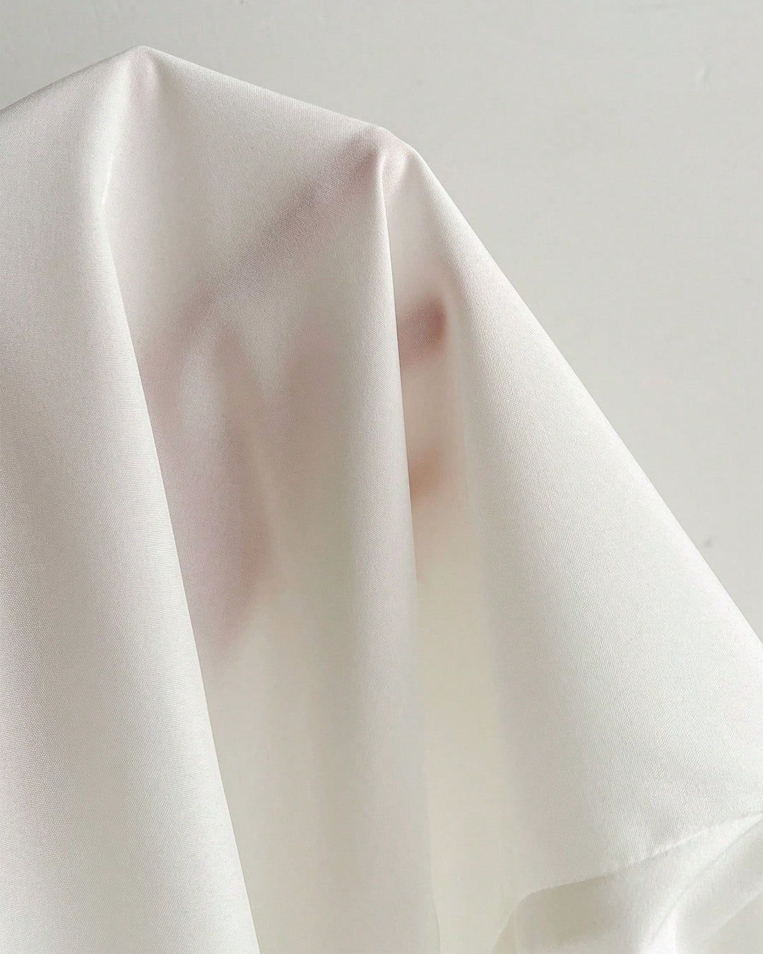 Ruffled V-Neck Curved Hem Solid Short Puff Sleeve Top in White