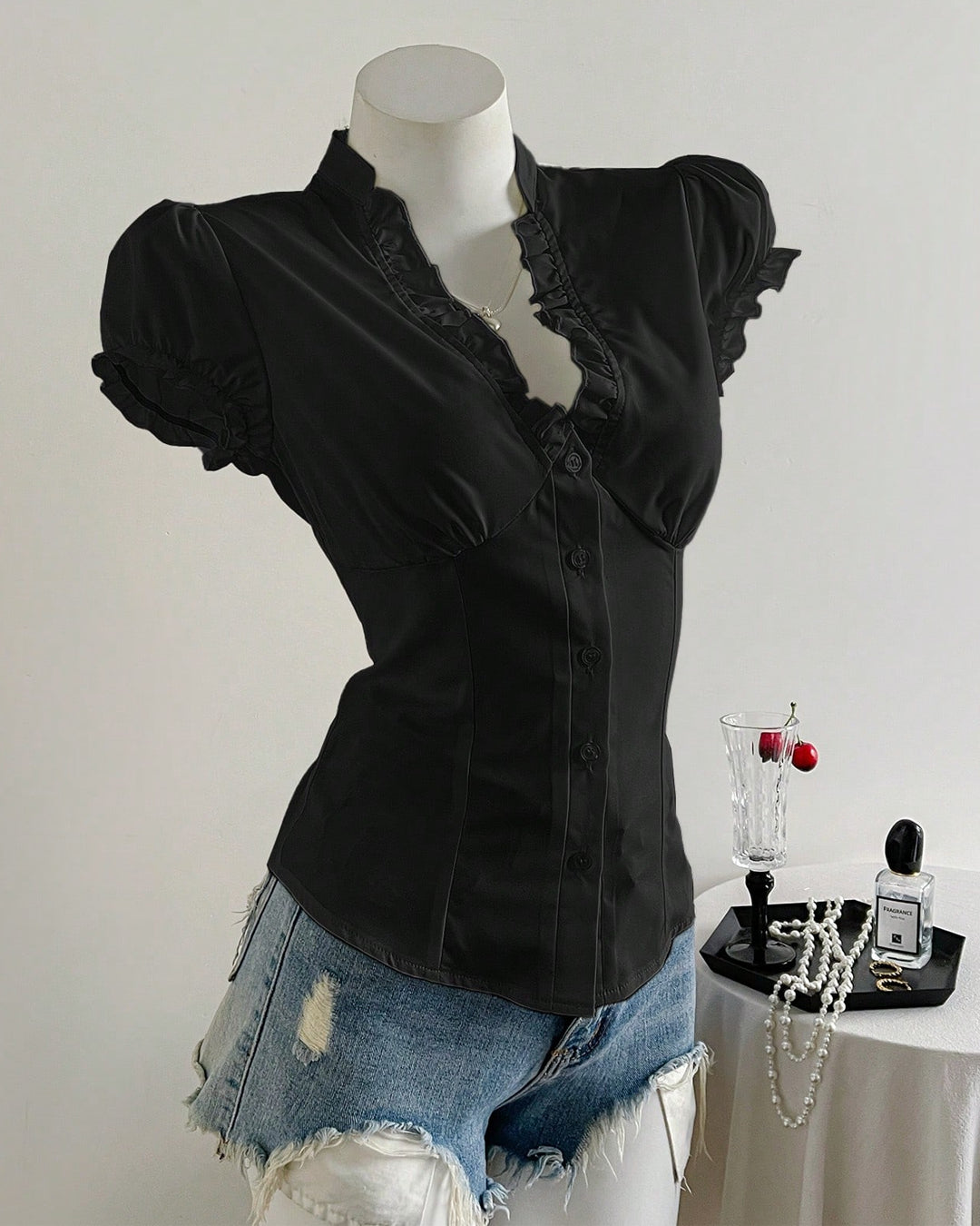 Ruffled V-Neck Curved Hem Solid Short Puff Sleeve Top in Black