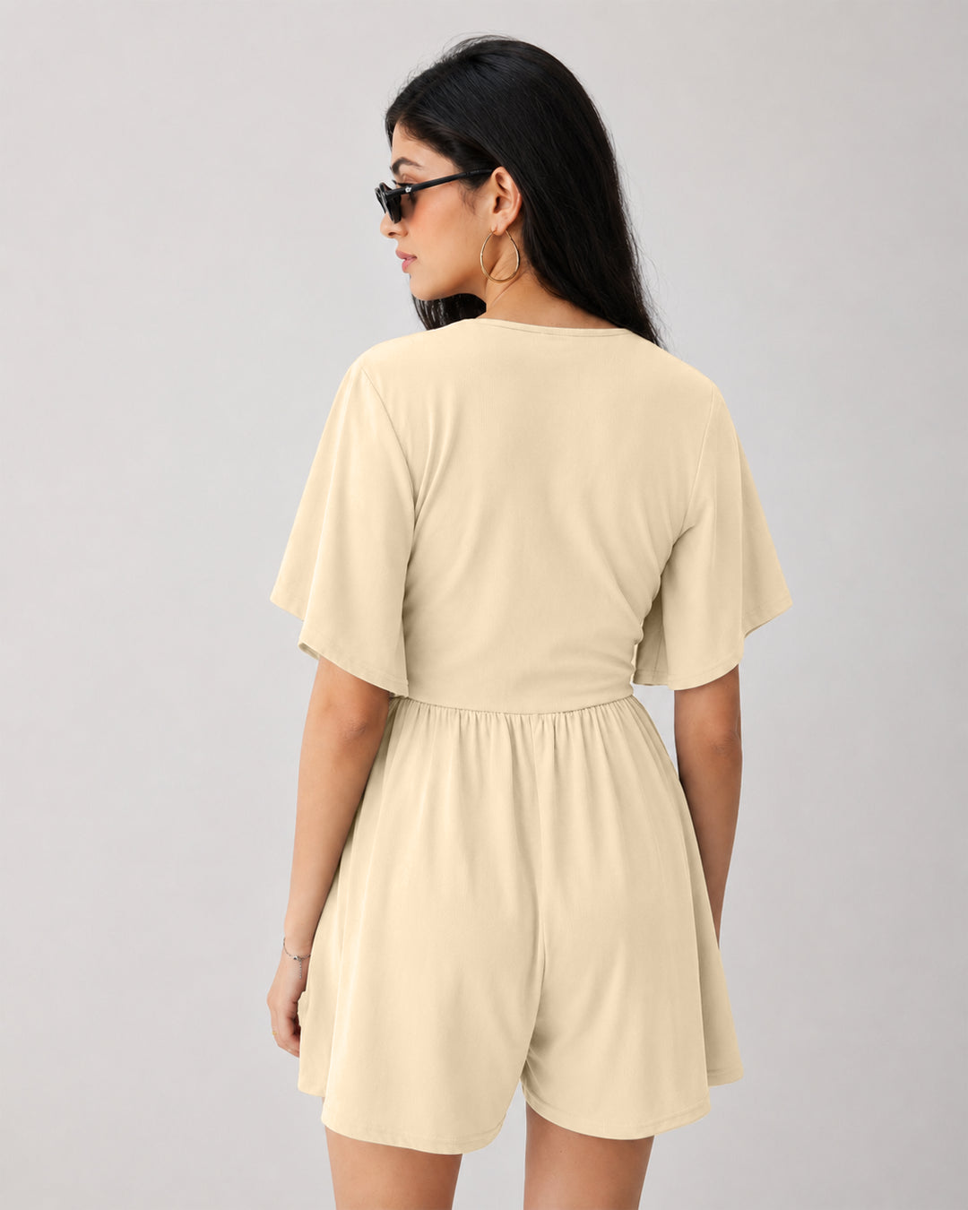 Ruched Plunge Neck Flutter Sleeve Romper in Apricot