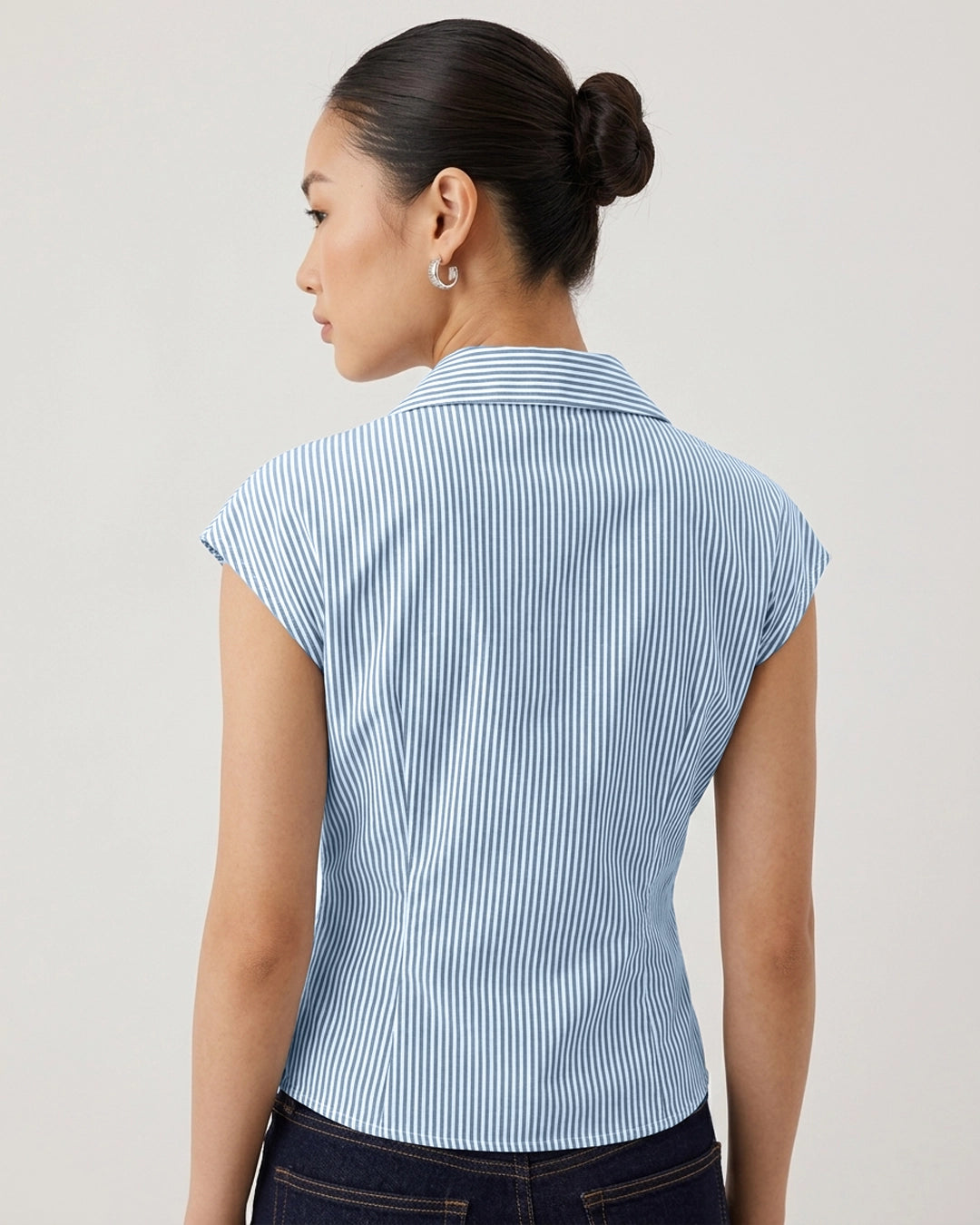 Collared Sleeveless Tie Waist Peplum Top in Baby Blue
