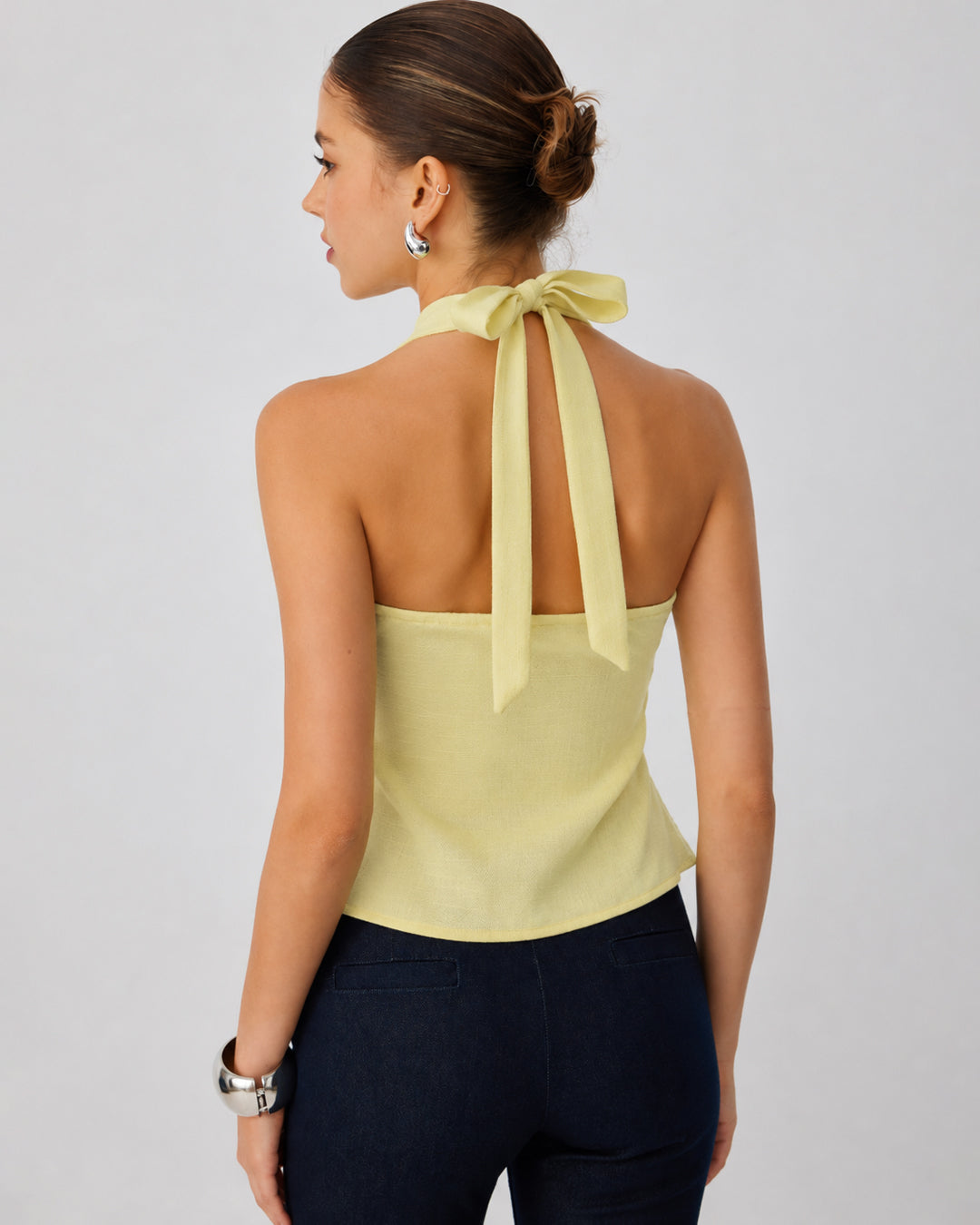 Halter Neck Peplum Top with Front Buckle Detail in Pastel Yellow