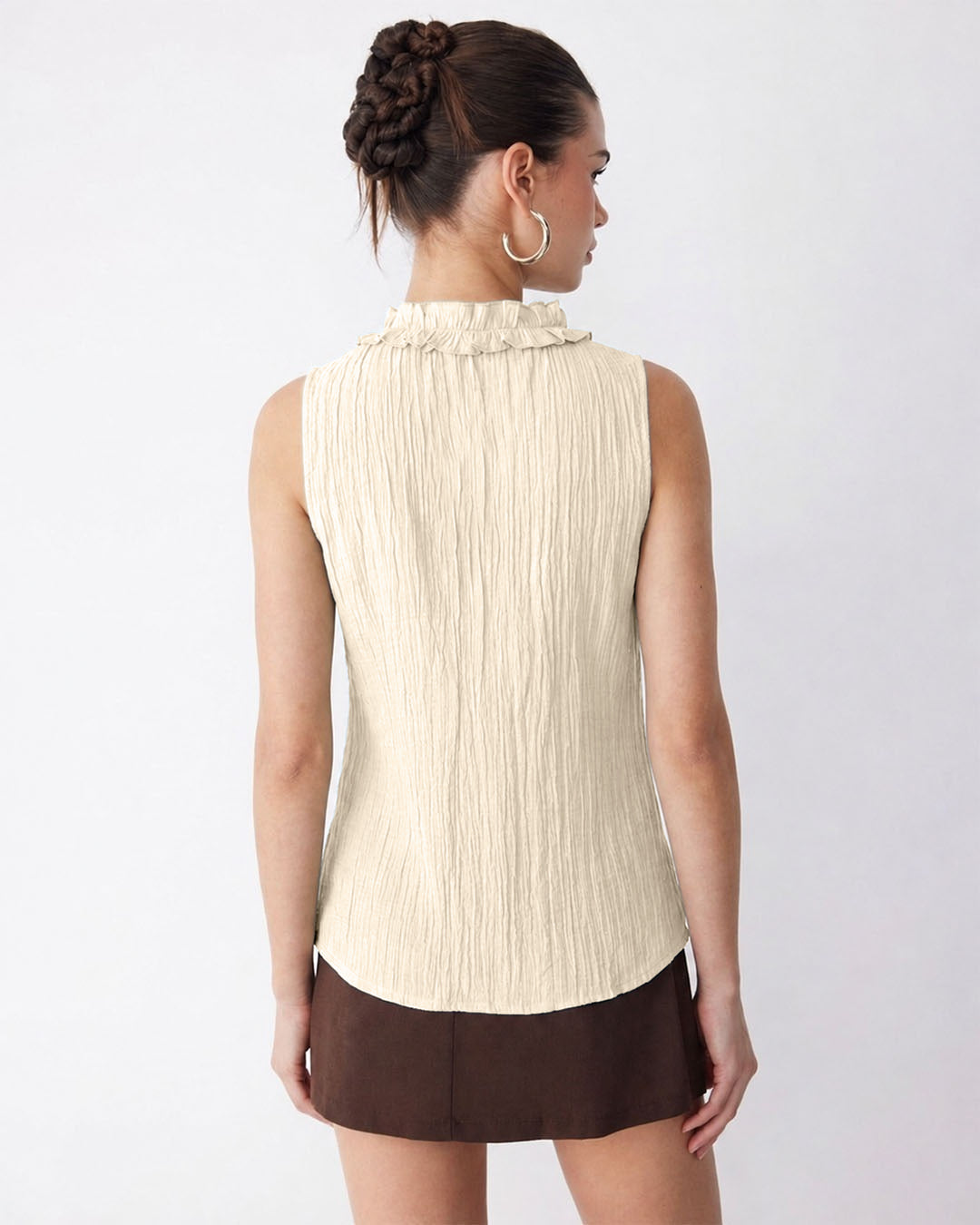 Ruffle Trim V Neck Sleeveless Peplum Top in Cream