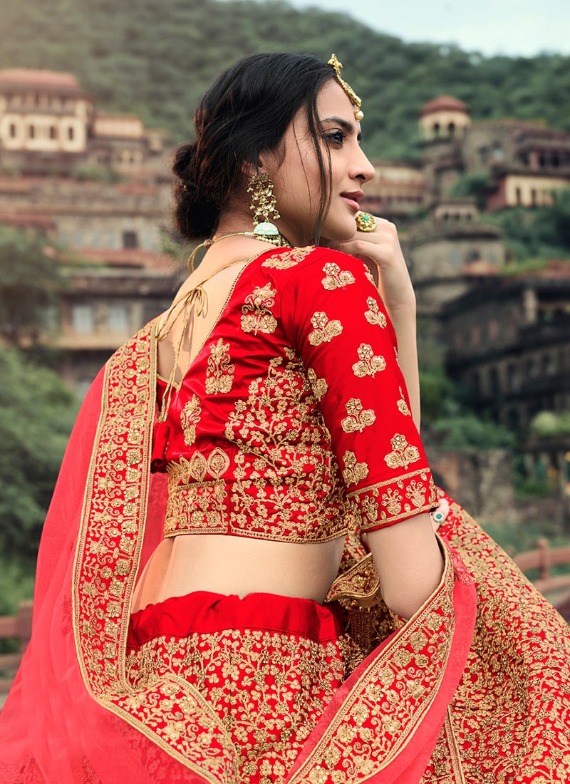 Red Color Zari And Stone Work Satin Material Bridal Lehenga