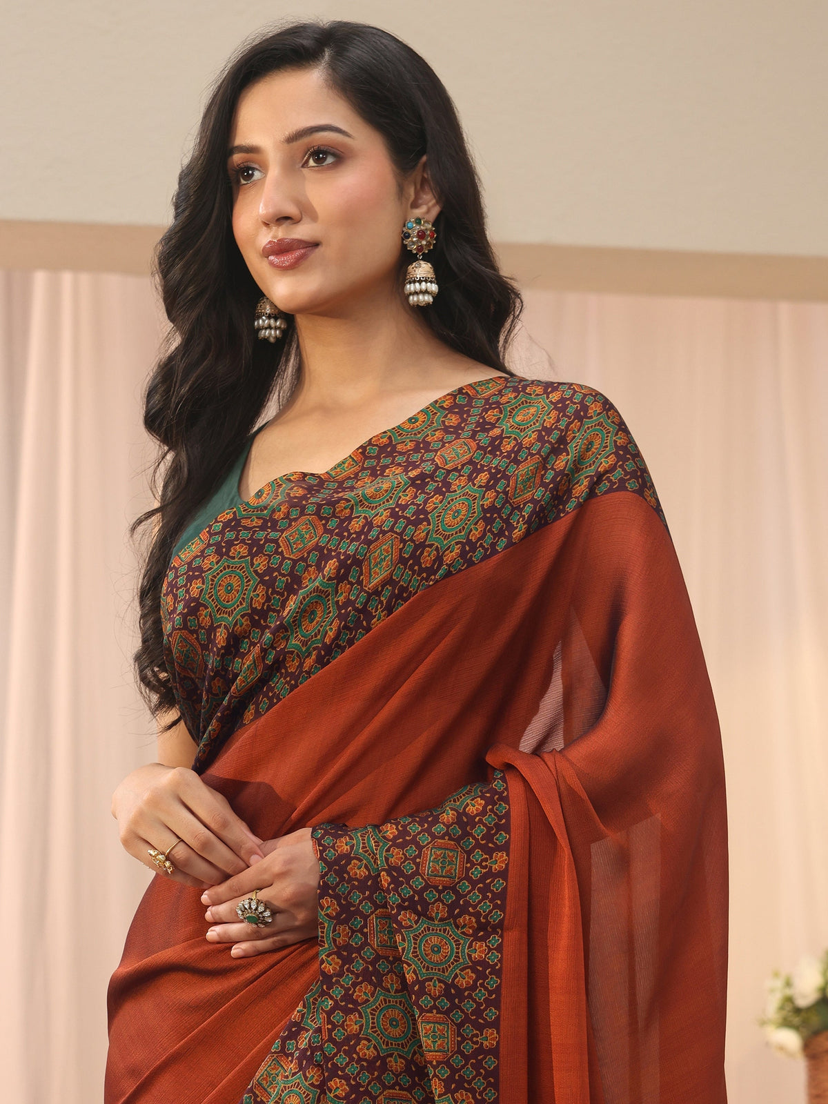 Anouk Rust Chiffon Saree with Printed Border