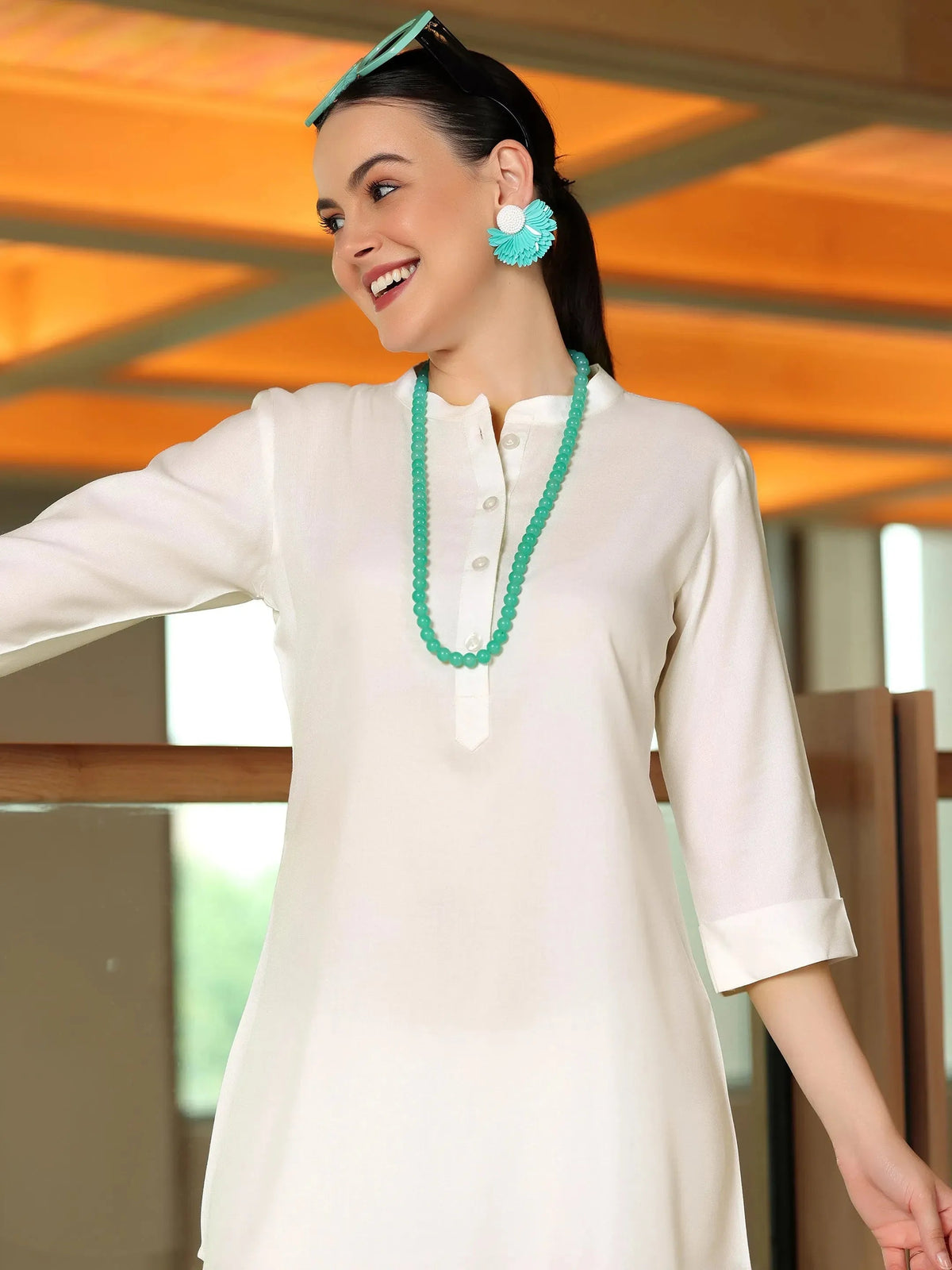 Anouk Off White Solid Rayon Straight Tunic