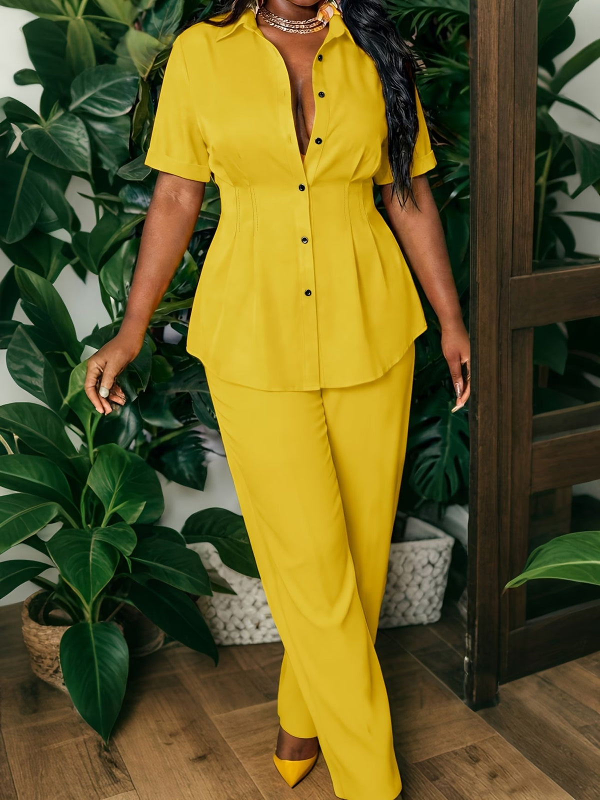 Two-Piece Set Featuring a Chic Top And Relaxed Long Pants