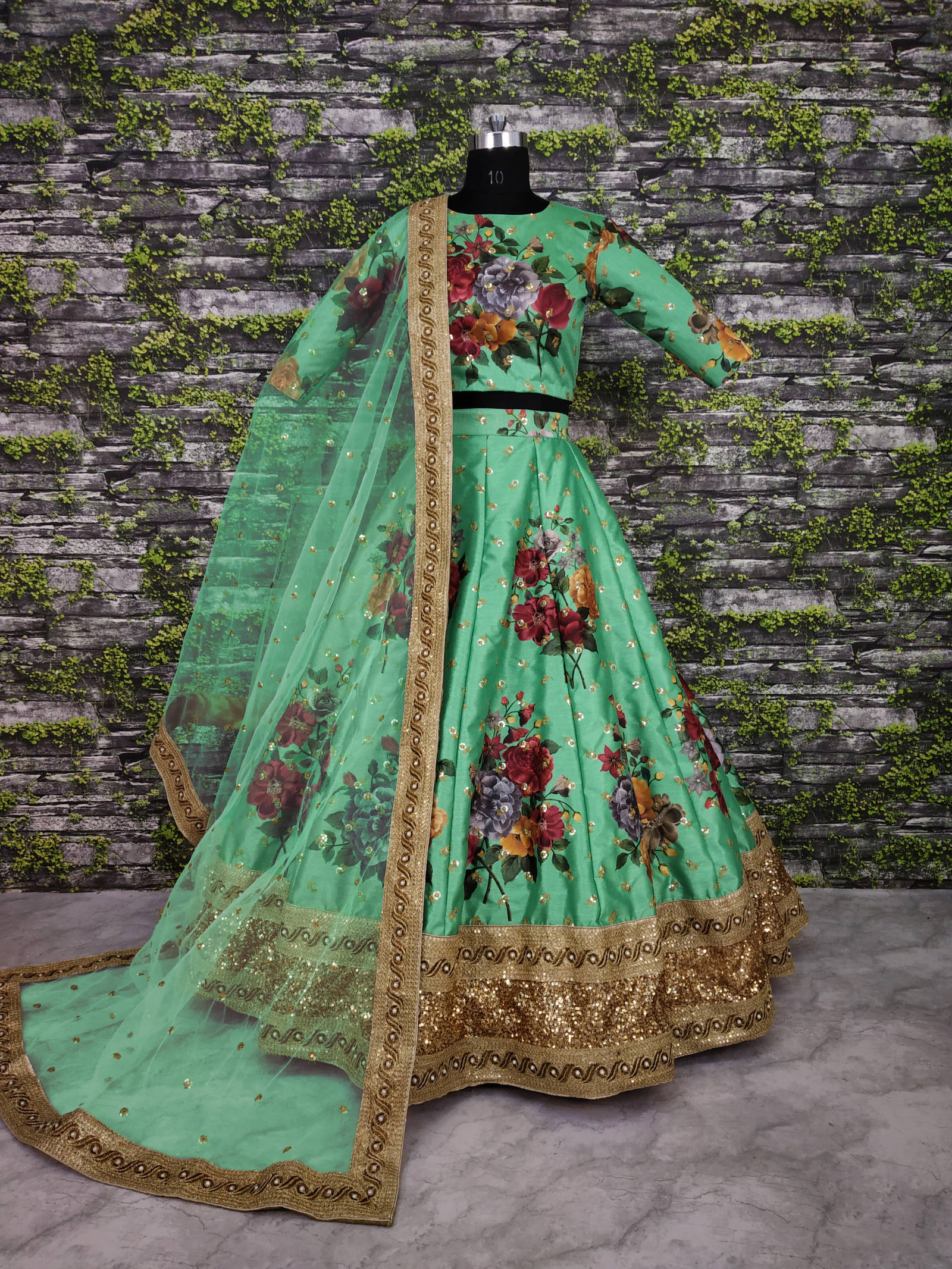 Gorgeous Green Colored Partywear Designer Embroidered Lehenga Choli