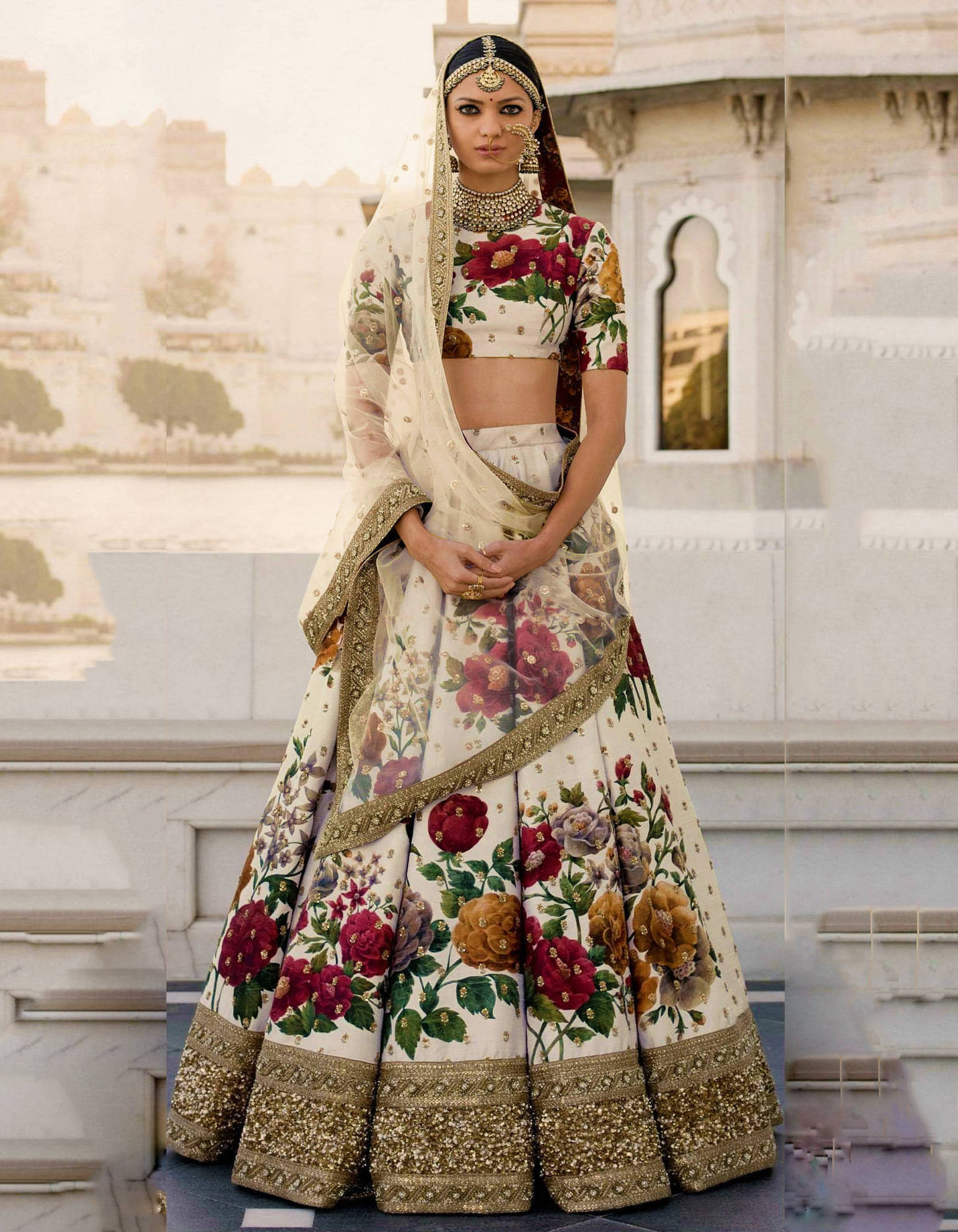 Gorgeous Cream Colored Partywear Designer Embroidered Lehenga Choli