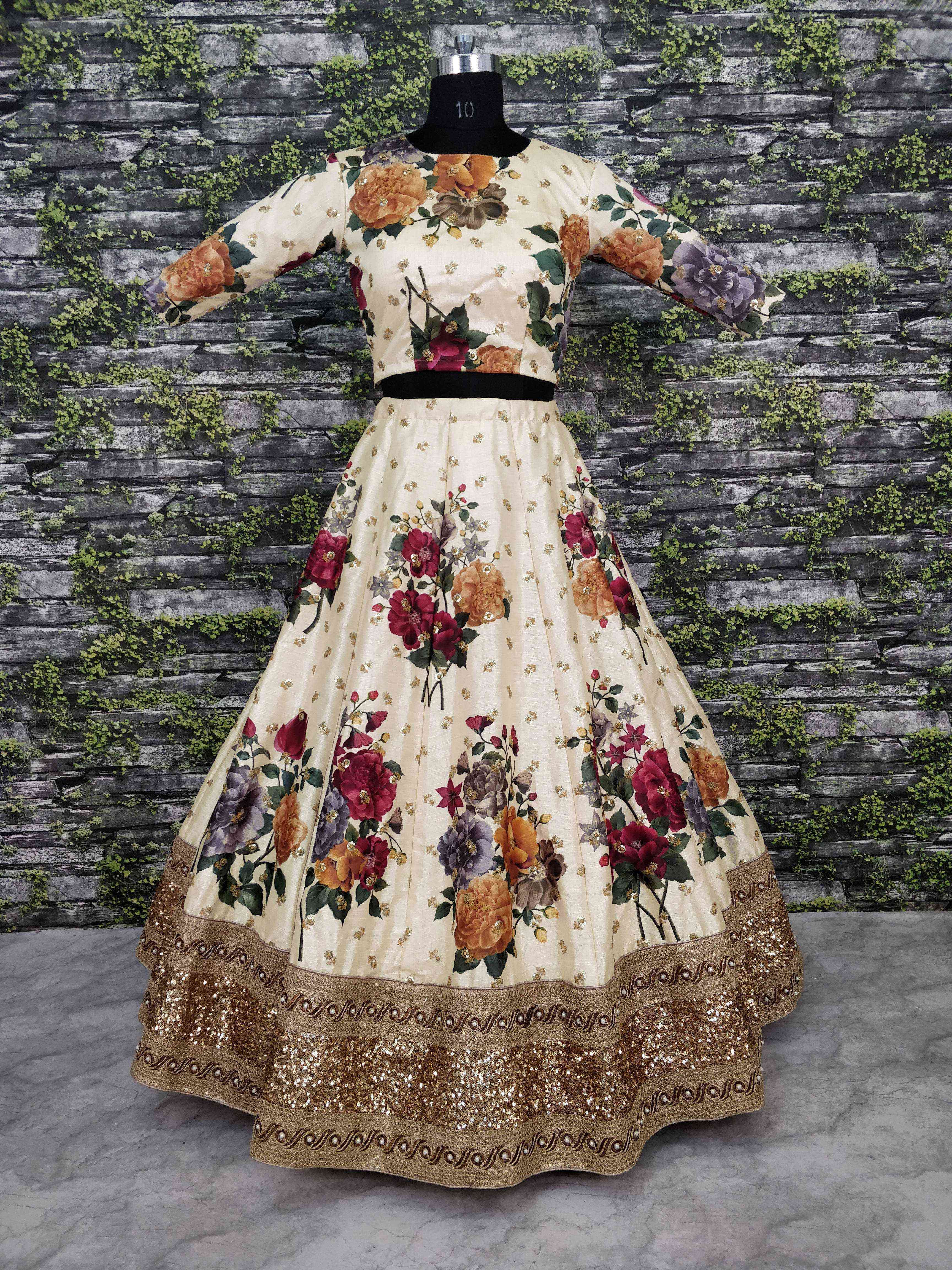 Gorgeous Cream Colored Partywear Designer Embroidered Lehenga Choli