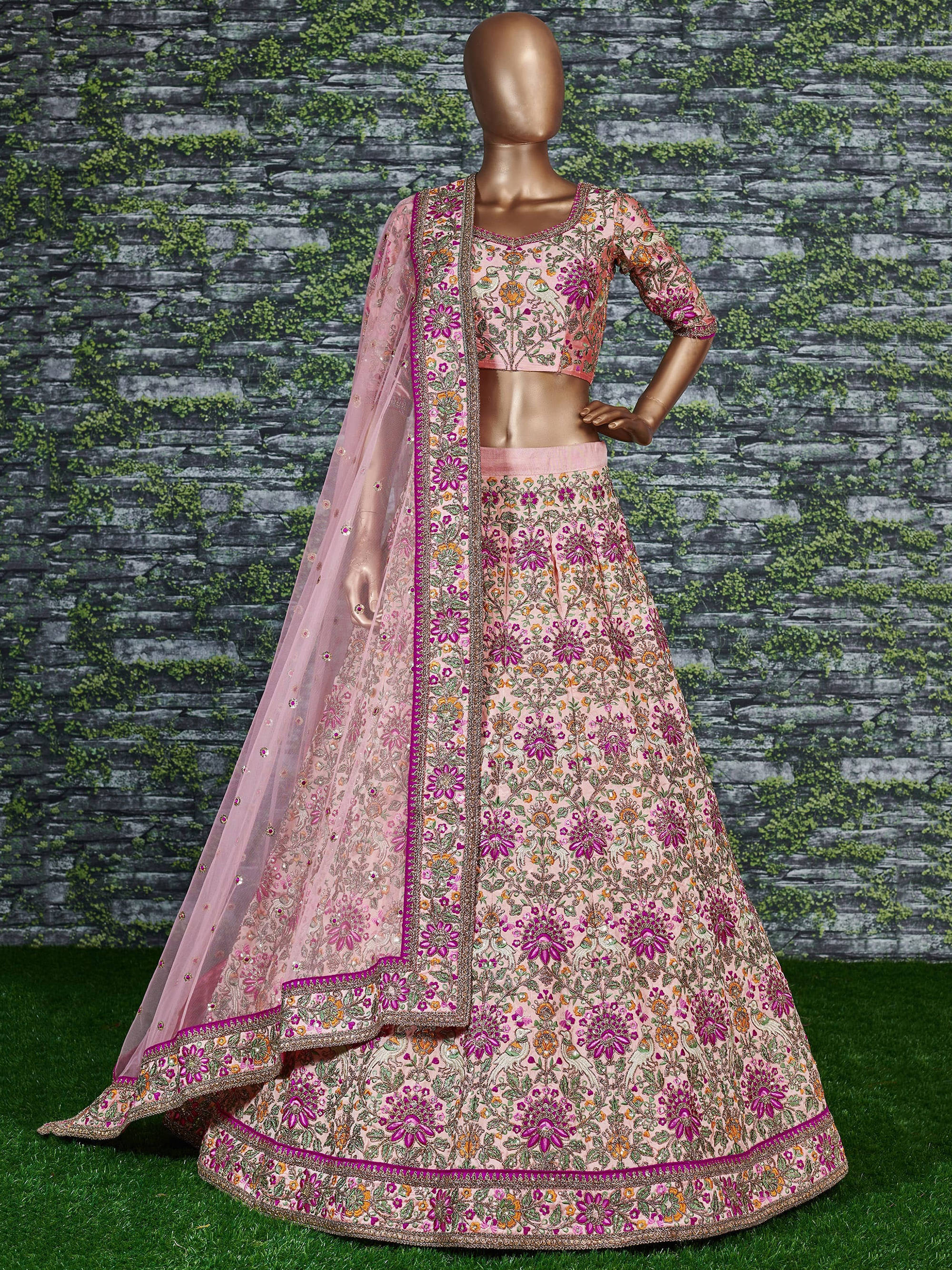Prominent peach Colored Bridal wear Embroidered Lehenga Choli