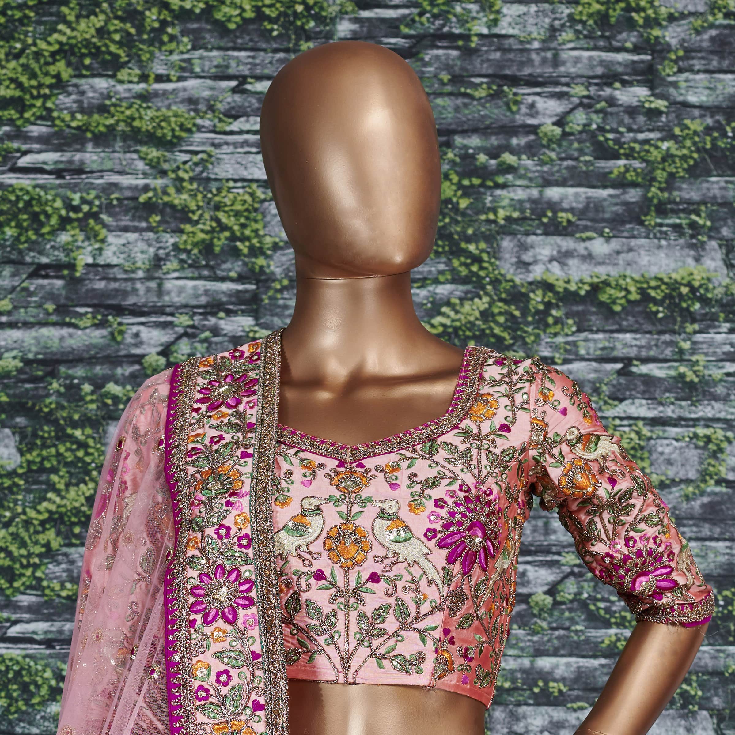 Prominent peach Colored Bridal wear Embroidered Lehenga Choli