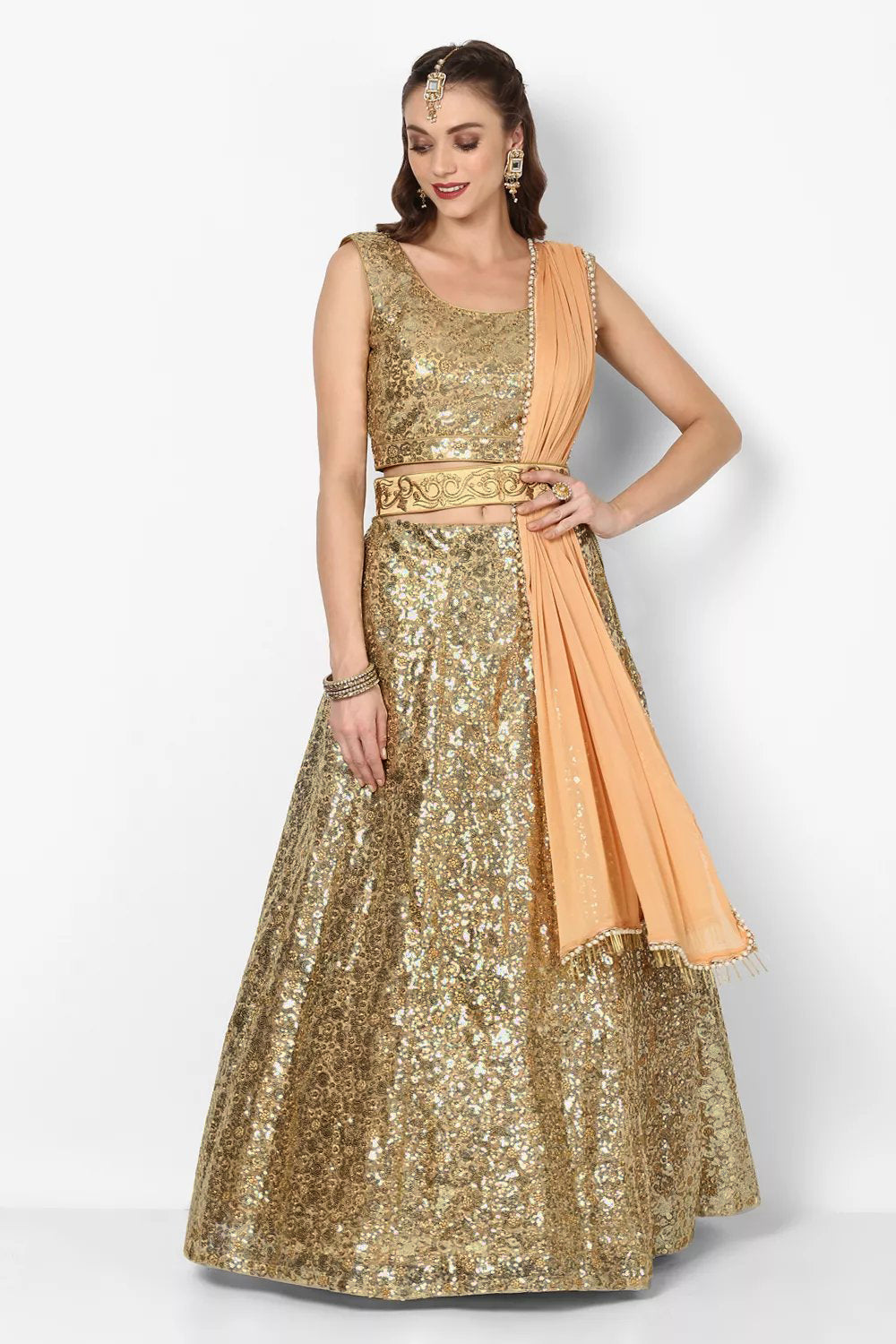 Stunning Golden Colored Party wear Embroidered Netted Lehenga Choli