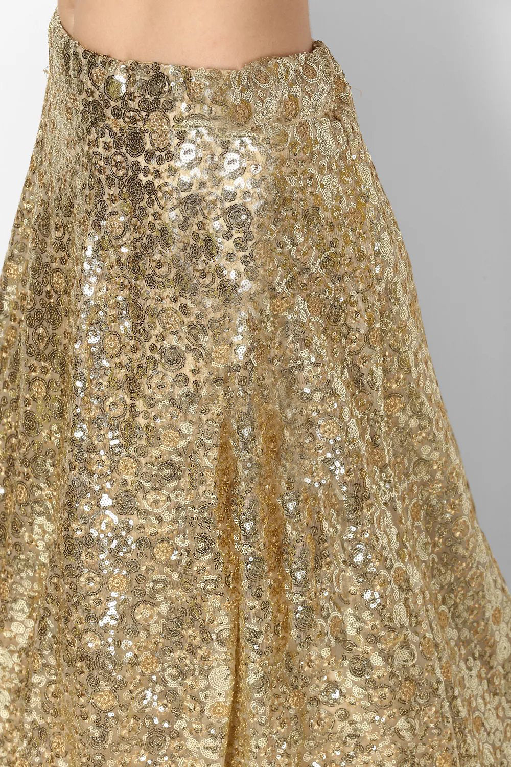 Stunning Golden Colored Party wear Embroidered Netted Lehenga Choli