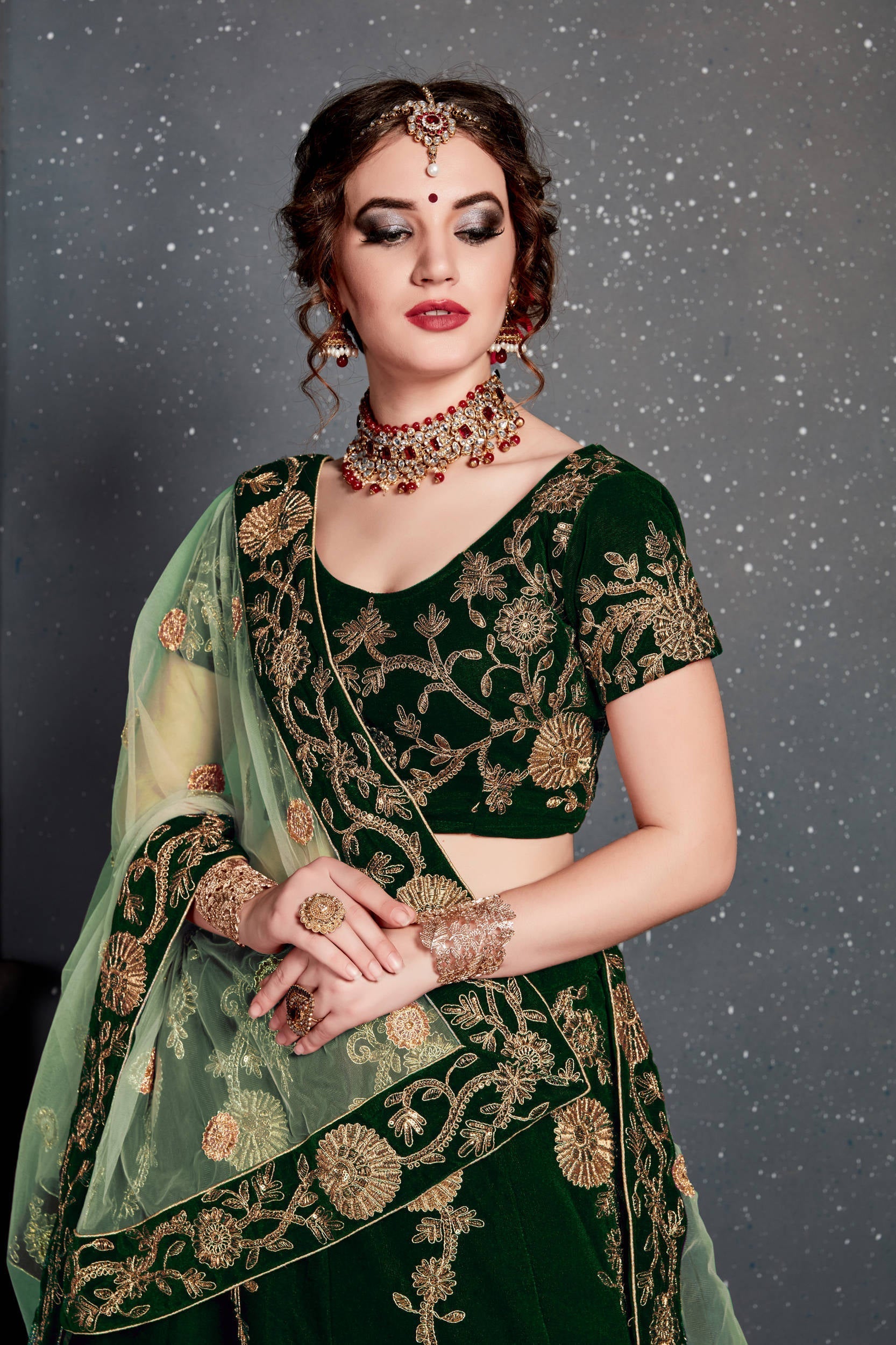 Demanding Dark Green Bridal Wear Embroidered Velvet Lehenga Choli