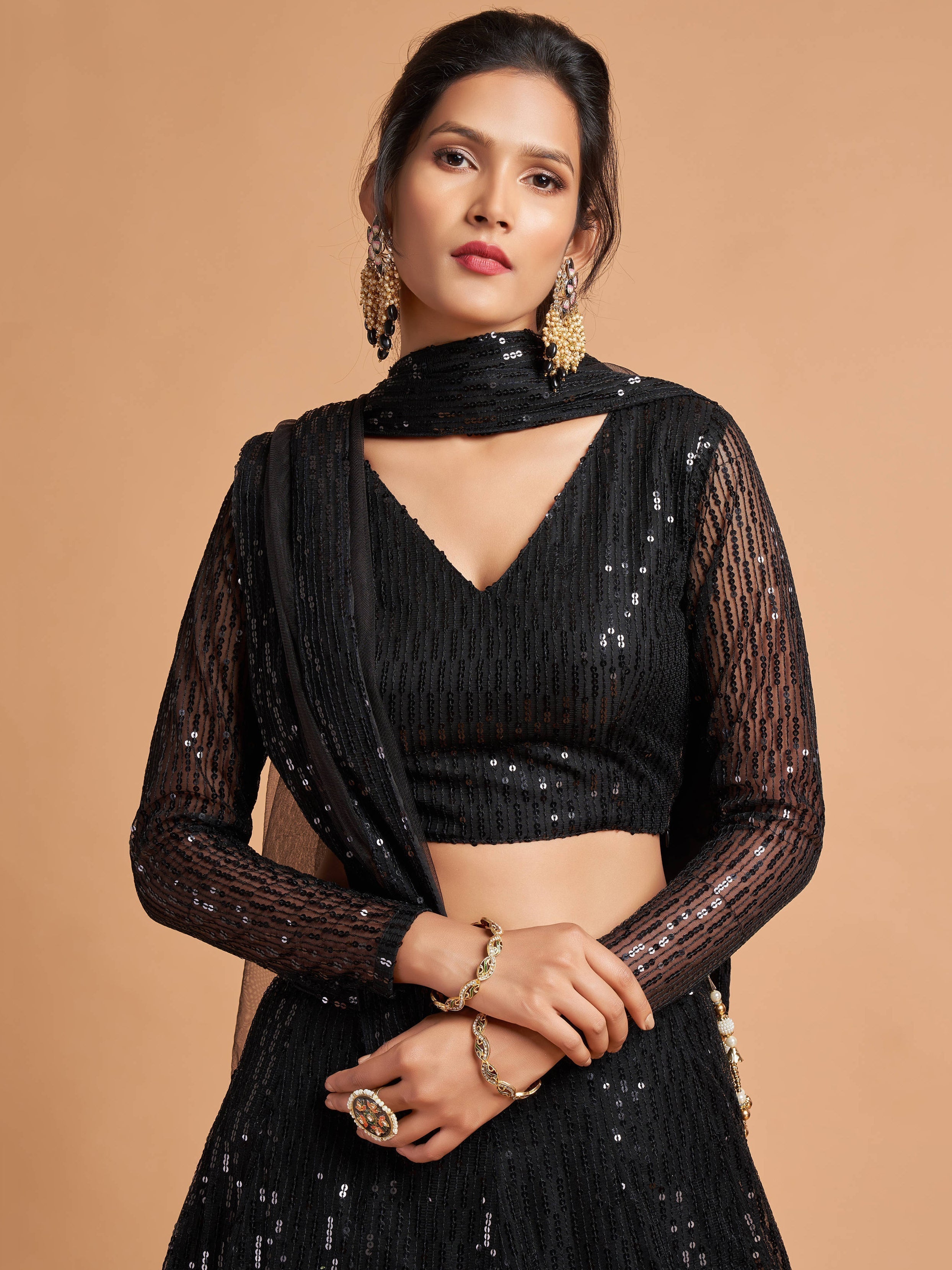 Shocking Black Sequence Embroidered Party Wear Net Lehenga Choli