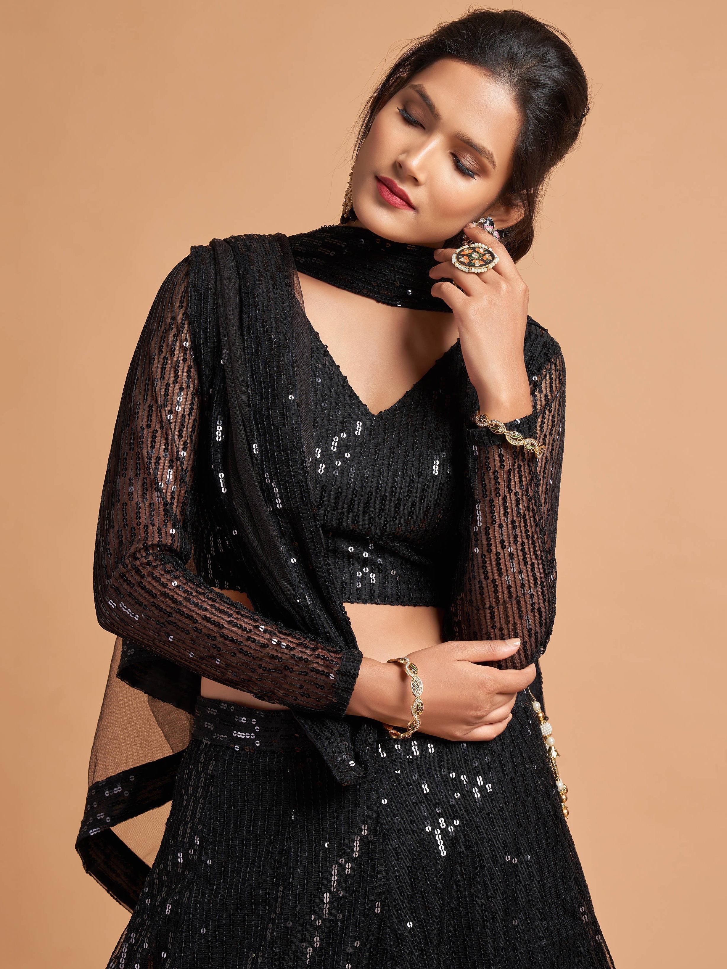 Shocking Black Sequence Embroidered Party Wear Net Lehenga Choli