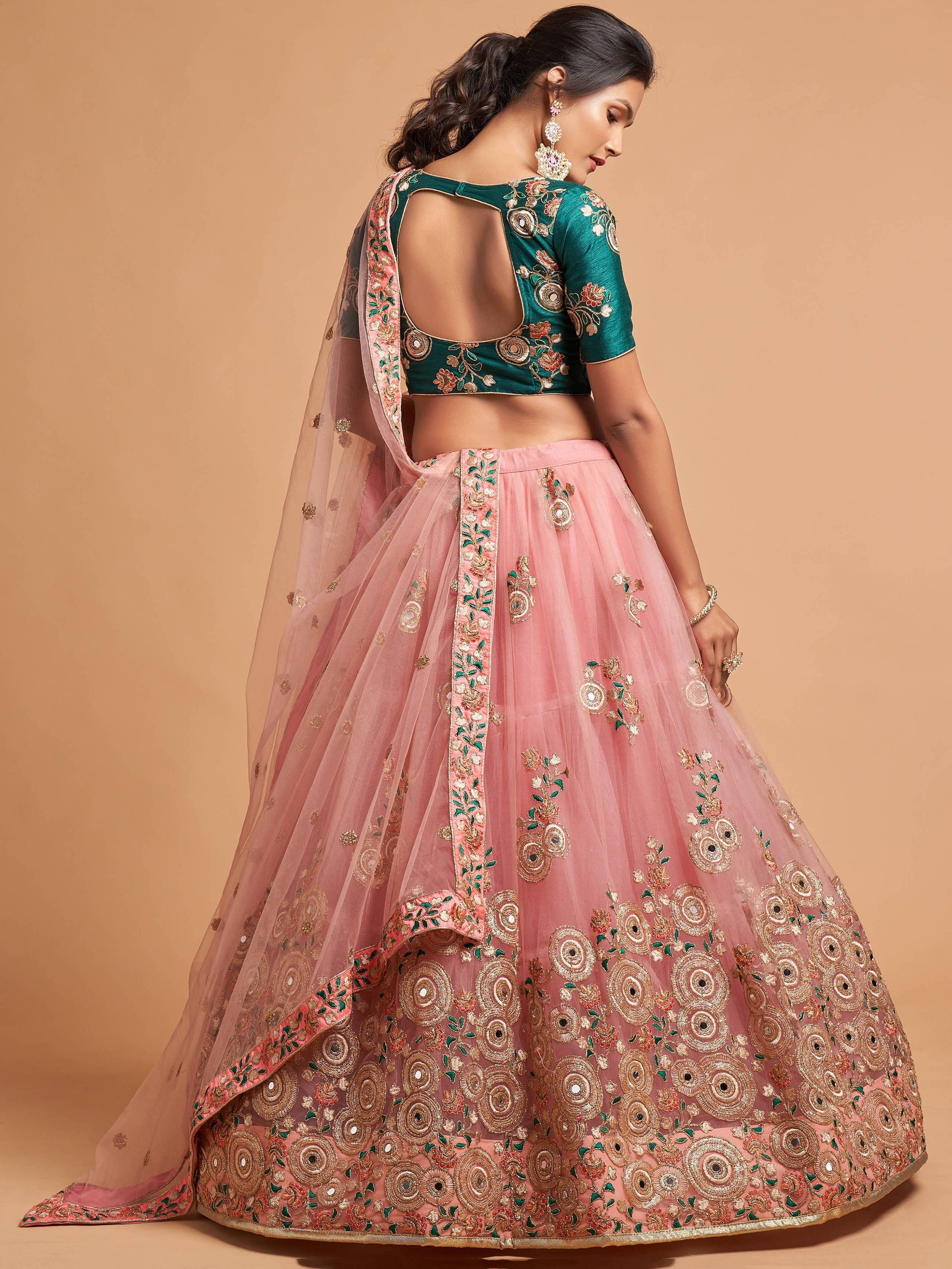 Lovely Peach Mirror work Soft Net Party Wear Lehenga Choli