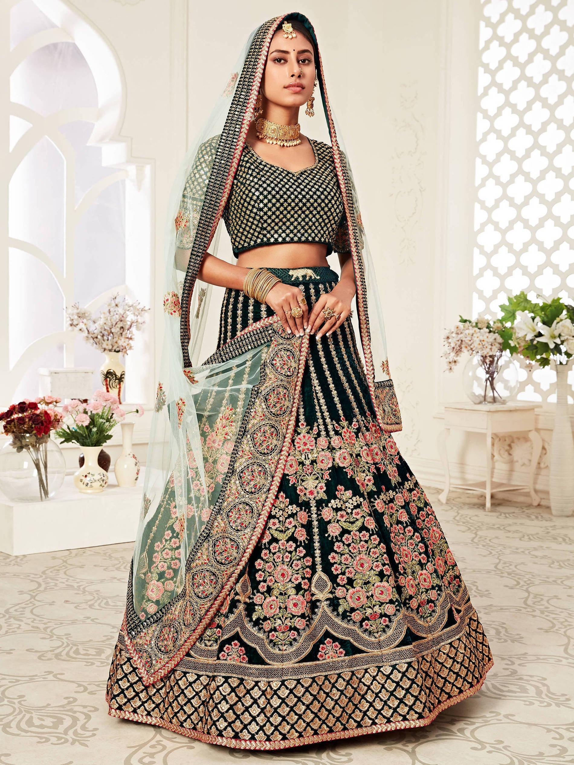 Glorious Bottle Green Heavily Embroidery Velvet Bridal Lehenga Choli With Light Blue Dupatta