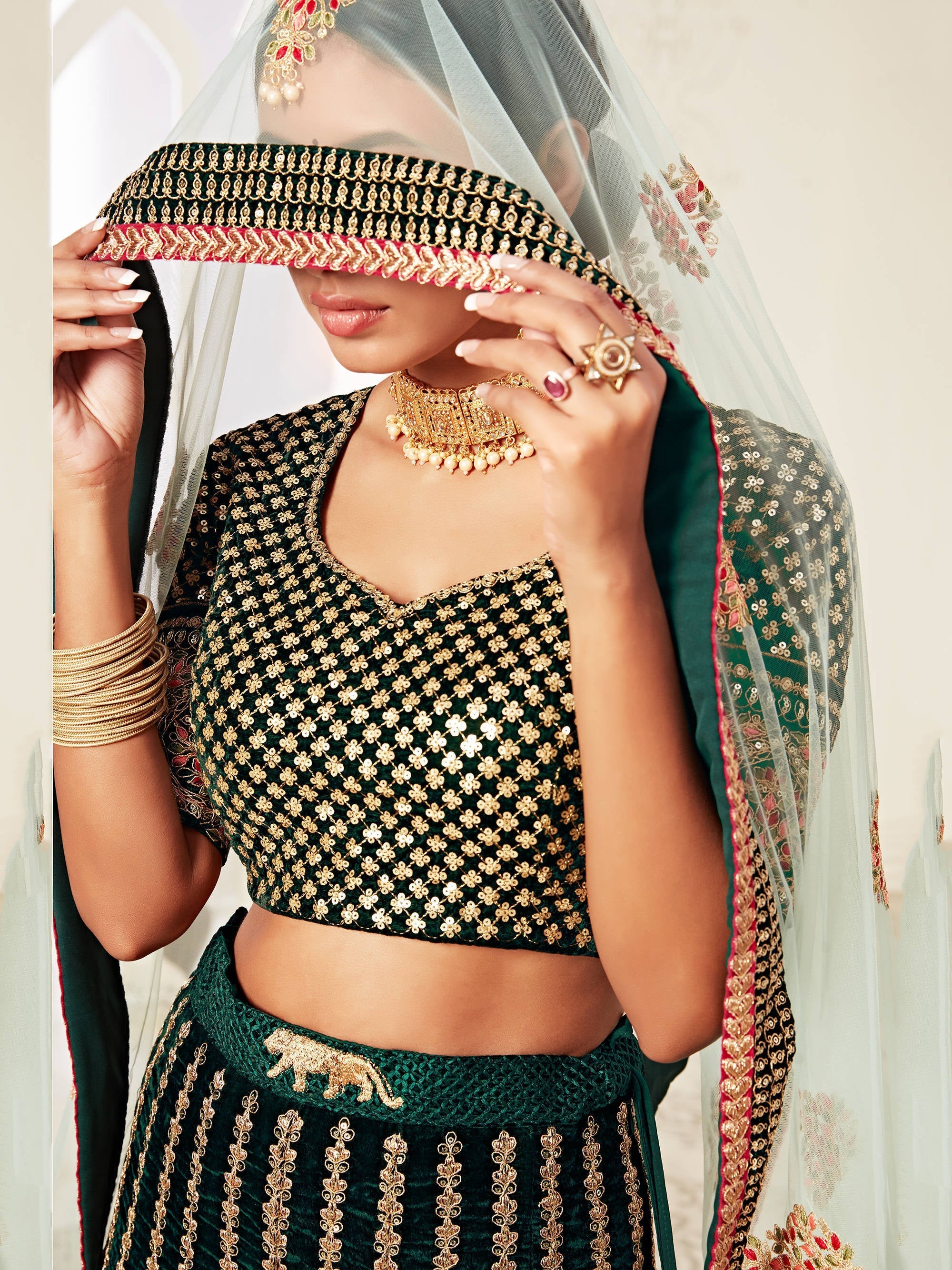 Glorious Bottle Green Heavily Embroidery Velvet Bridal Lehenga Choli With Light Blue Dupatta